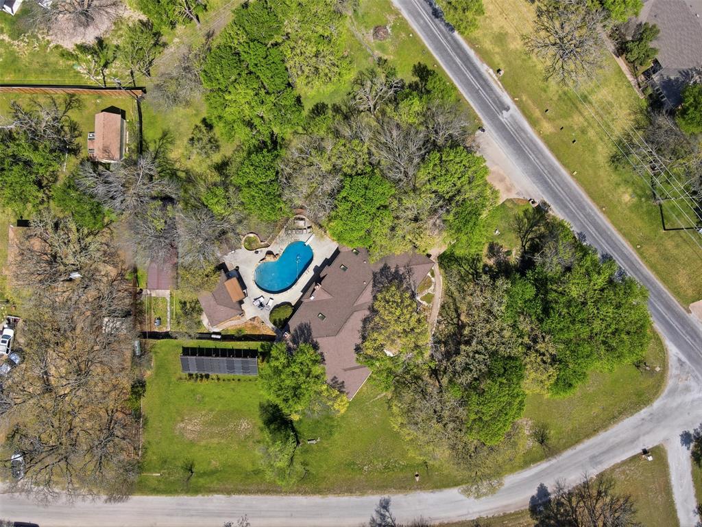 3000 Yucca Road Willow Park, TX 76087 - Photo 23 of 38 an aerial view of a house with a garden and plants