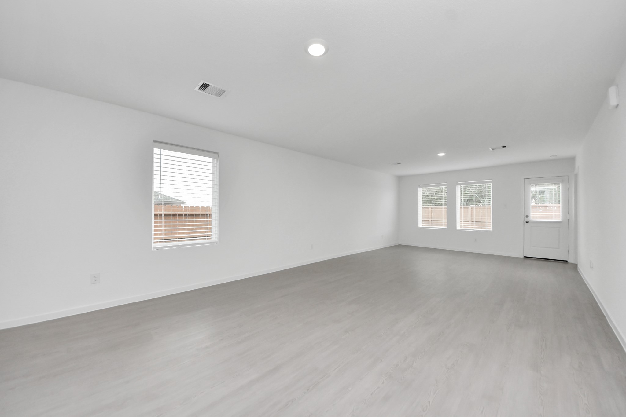 7730 Lavender Jade Drive Rosharon, TX 77583 - Photo 18 of 45 an empty room with windows