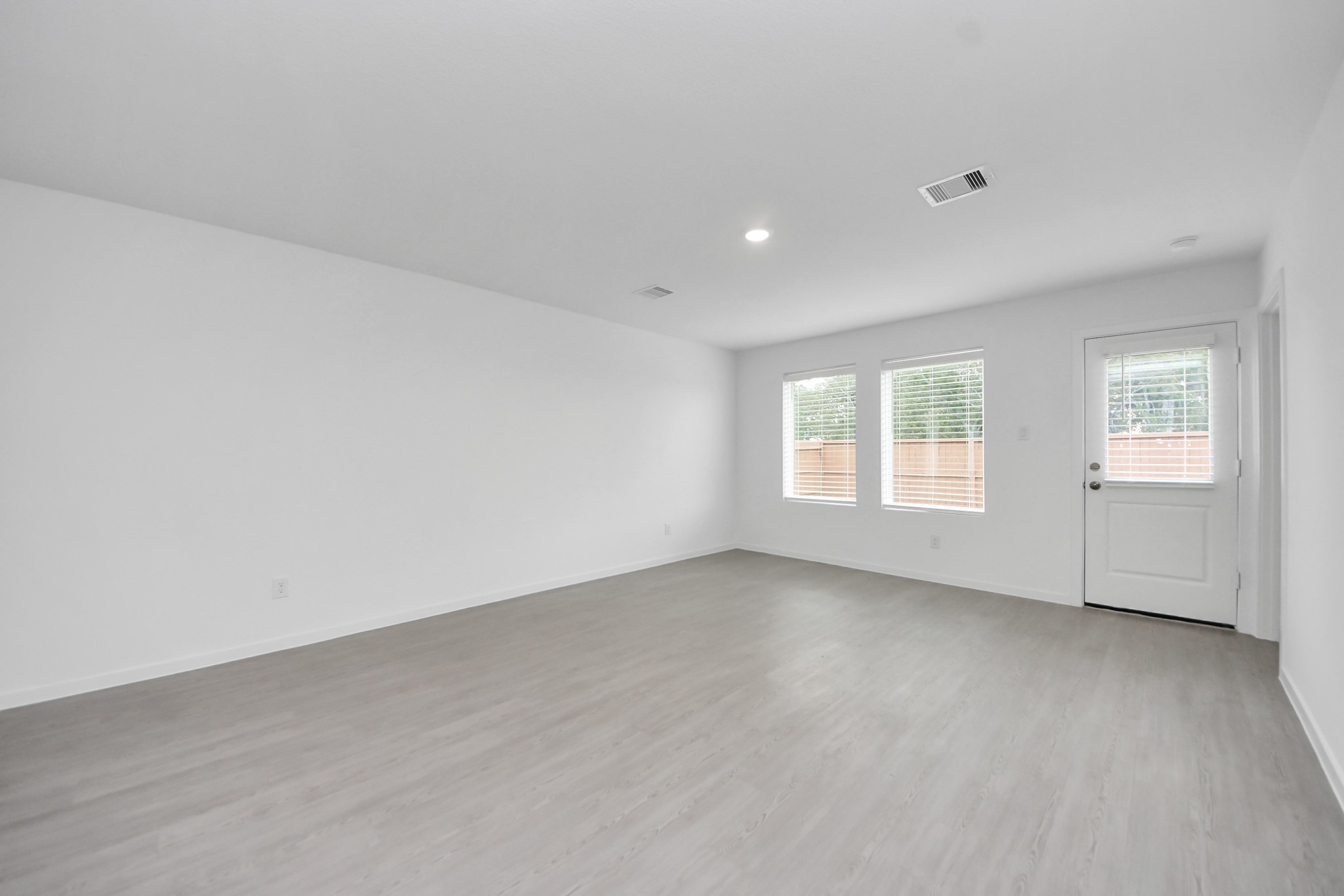 7730 Lavender Jade Drive Rosharon, TX 77583 - Photo 20 of 45 an empty room with windows
