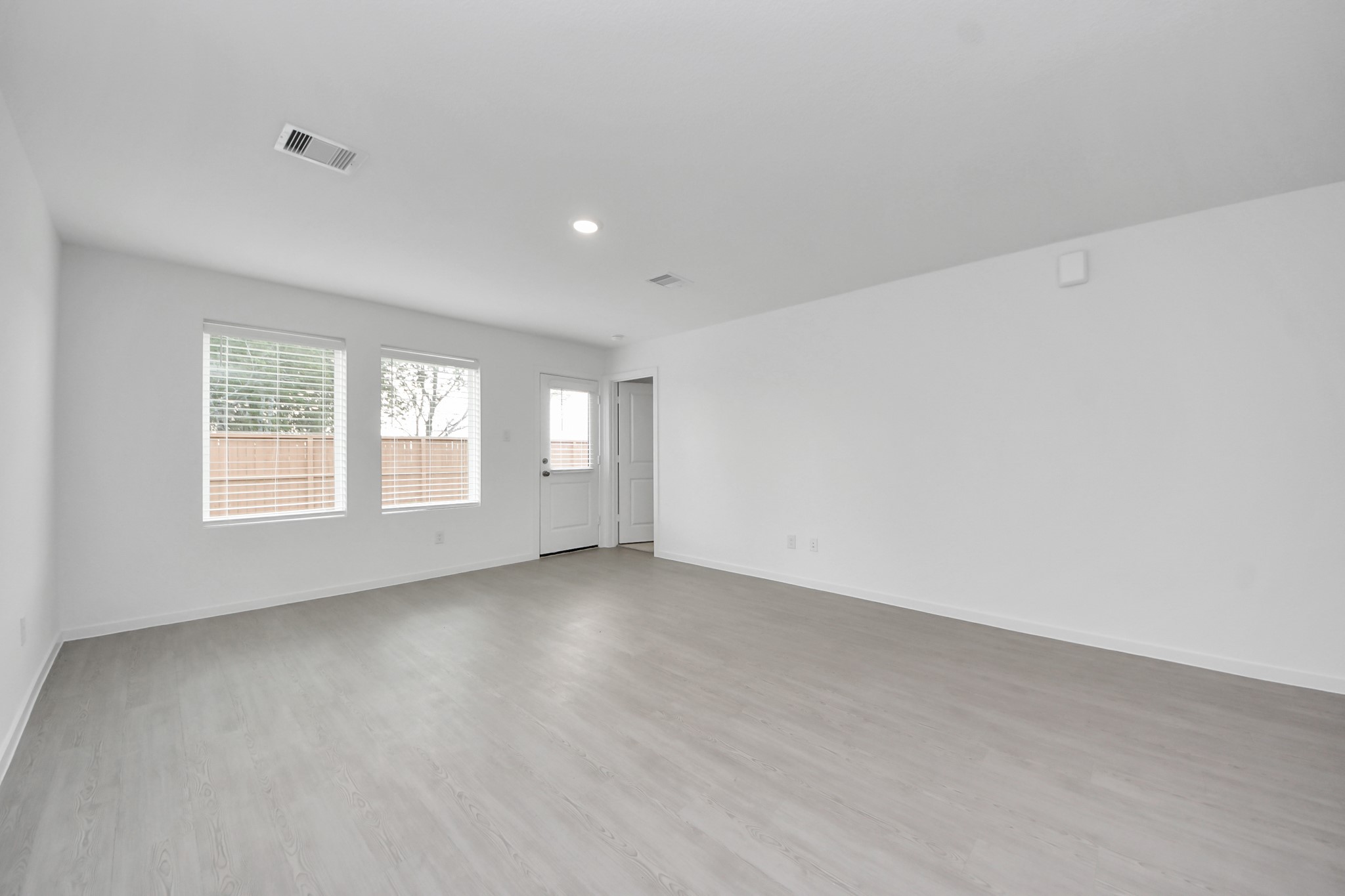 7730 Lavender Jade Drive Rosharon, TX 77583 - Photo 21 of 45 an empty room with windows