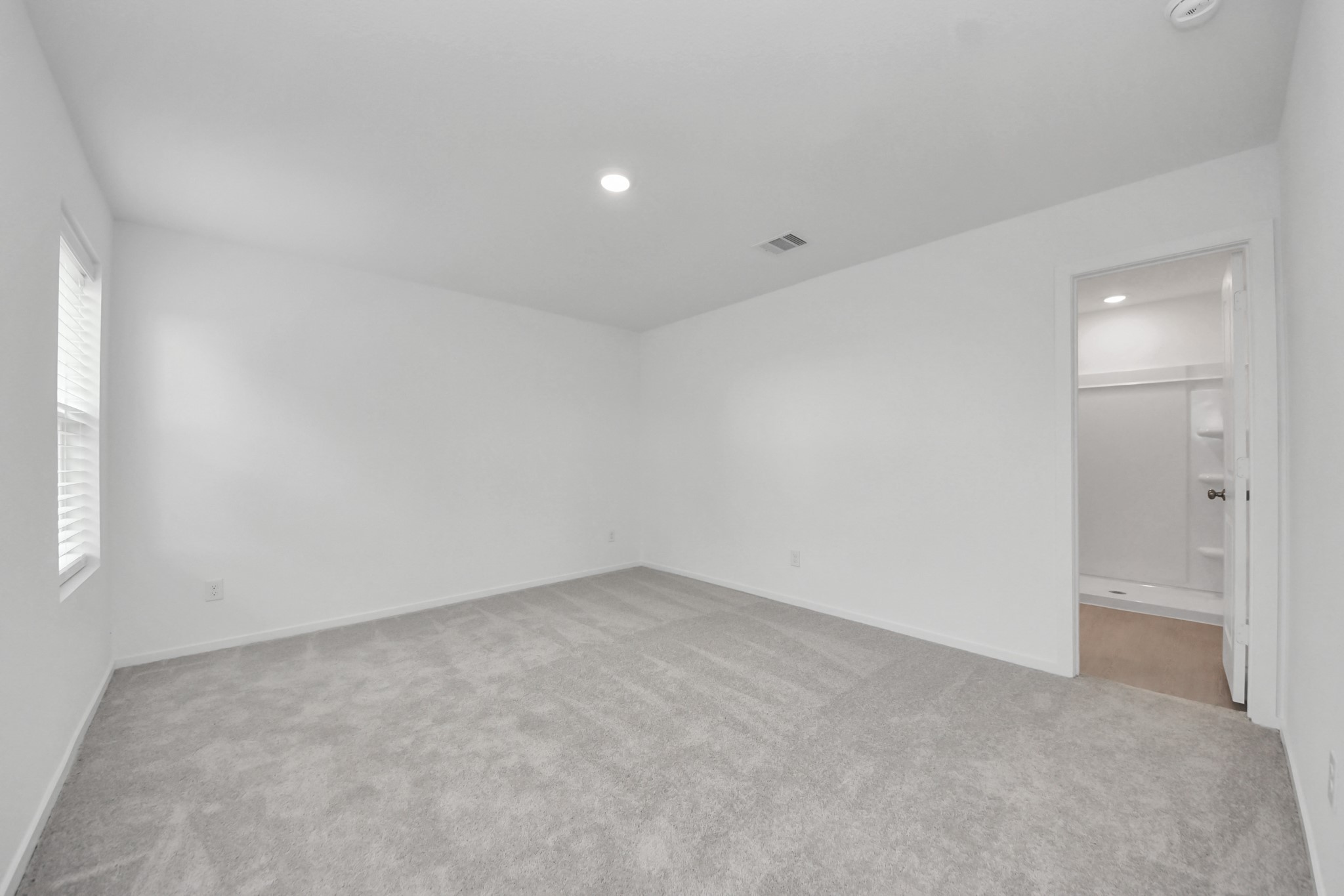 7730 Lavender Jade Drive Rosharon, TX 77583 - Photo 23 of 45 an empty room with a natural light