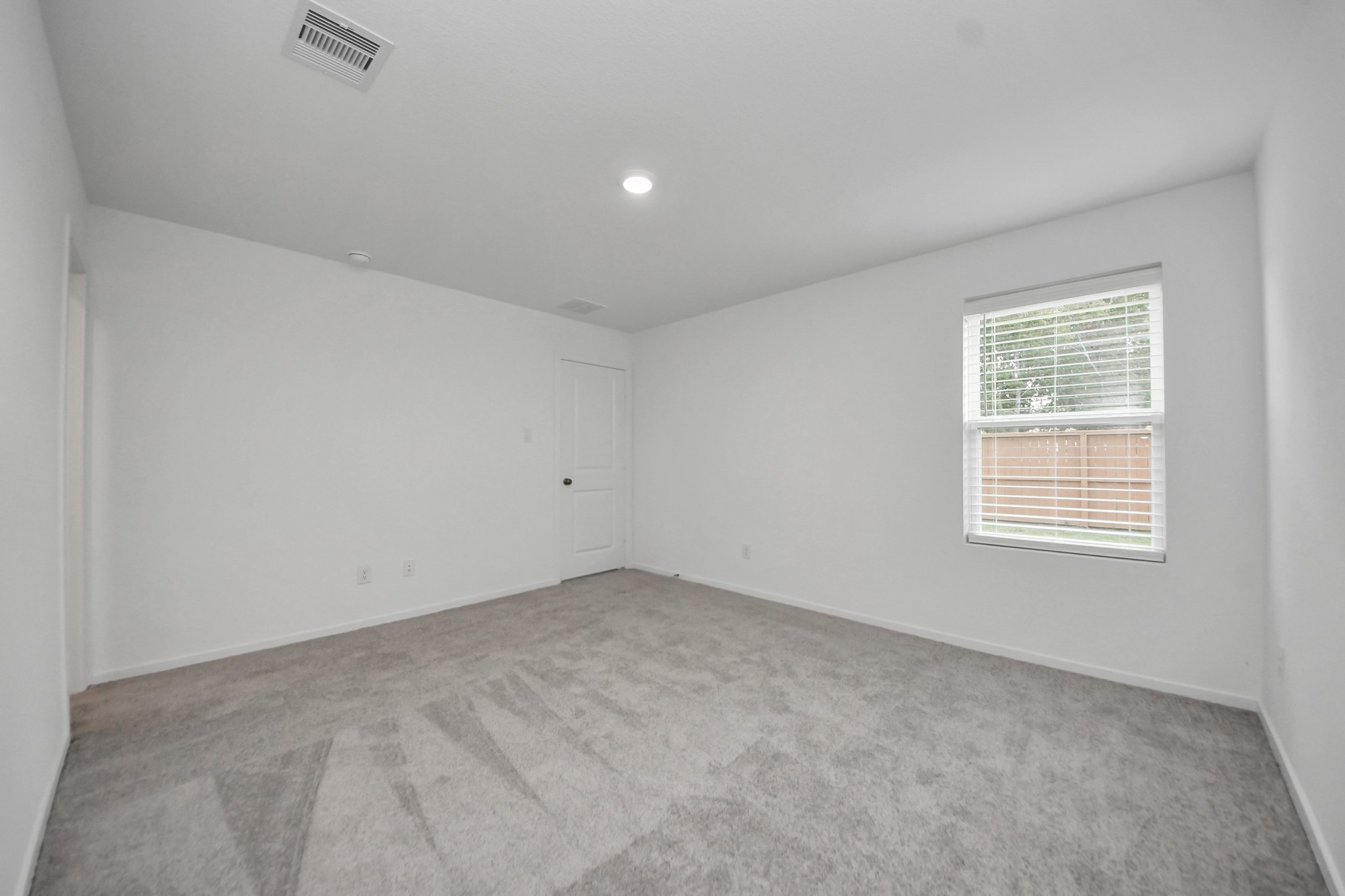 7730 Lavender Jade Drive Rosharon, TX 77583 - Photo 25 of 45 an empty room with a window