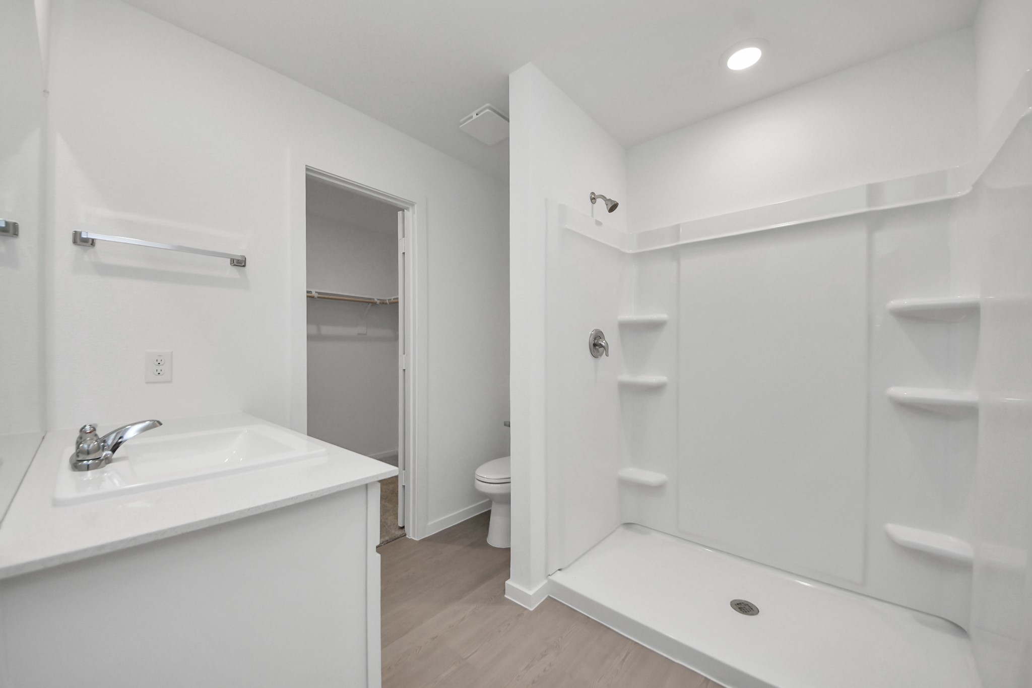 7730 Lavender Jade Drive Rosharon, TX 77583 - Photo 27 of 45 a bathroom with a sink a toilet and shower