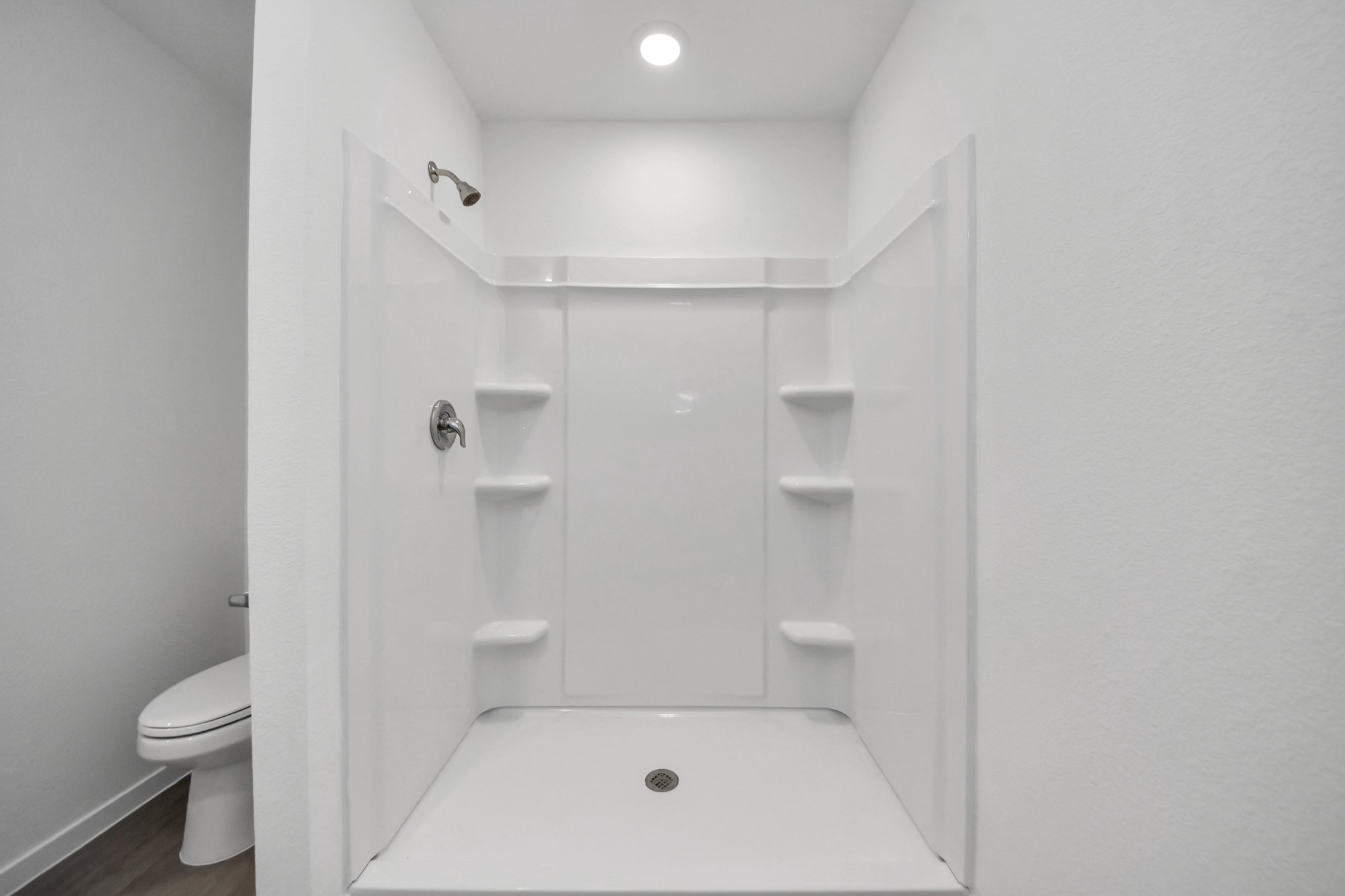 7730 Lavender Jade Drive Rosharon, TX 77583 - Photo 31 of 45 a bathroom with a toilet and a shower