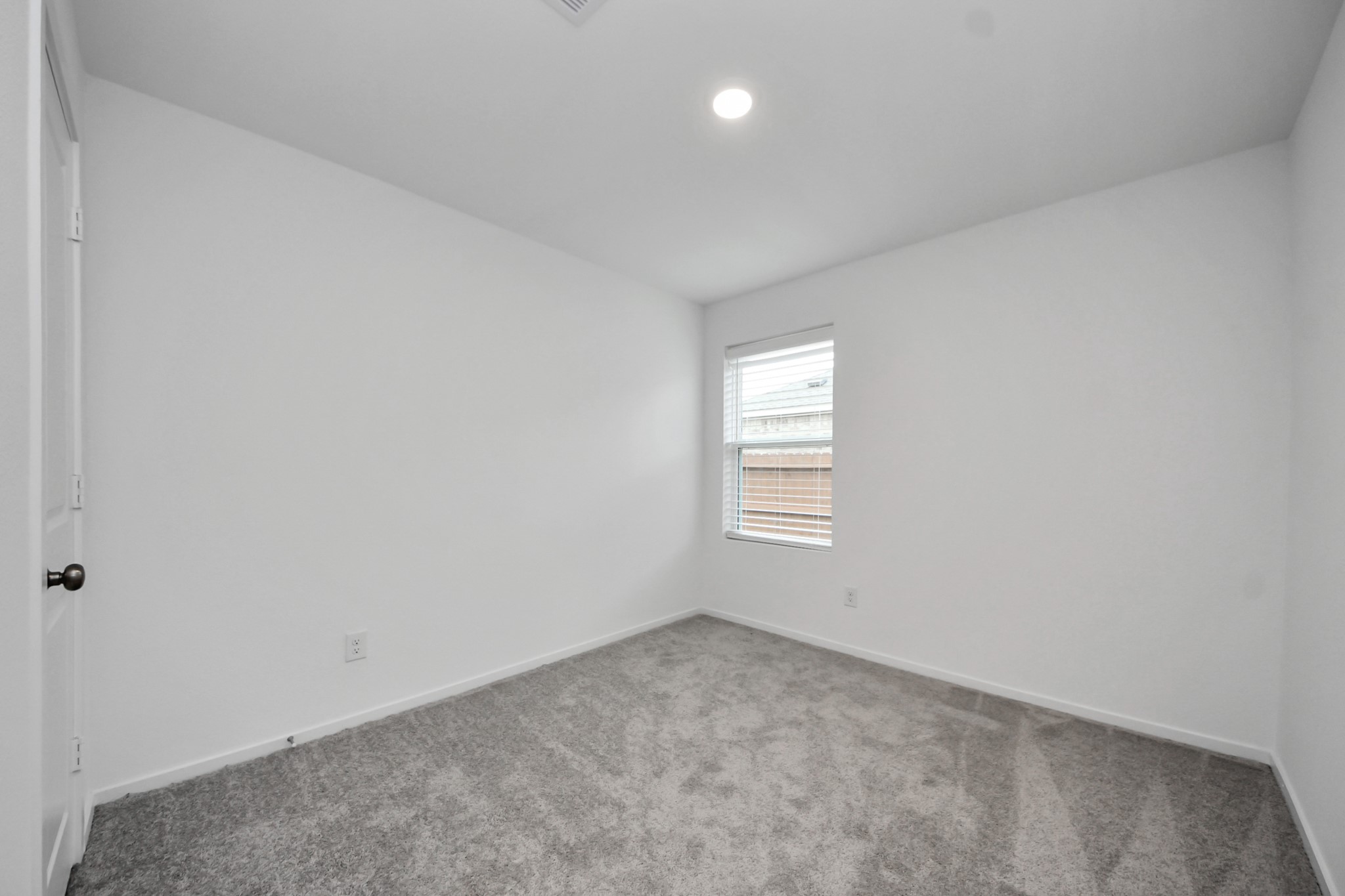 7730 Lavender Jade Drive Rosharon, TX 77583 - Photo 34 of 45 an empty room with a window