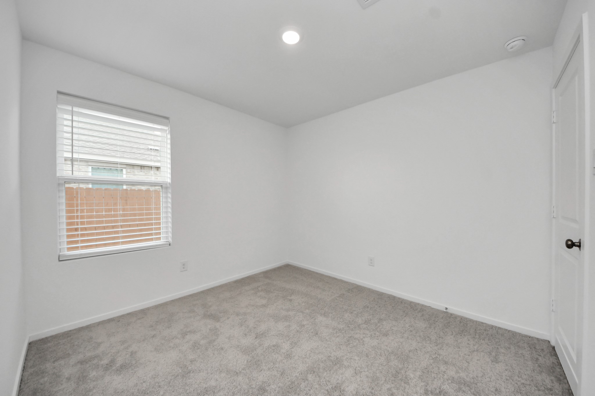 7730 Lavender Jade Drive Rosharon, TX 77583 - Photo 35 of 45 an empty room with a window