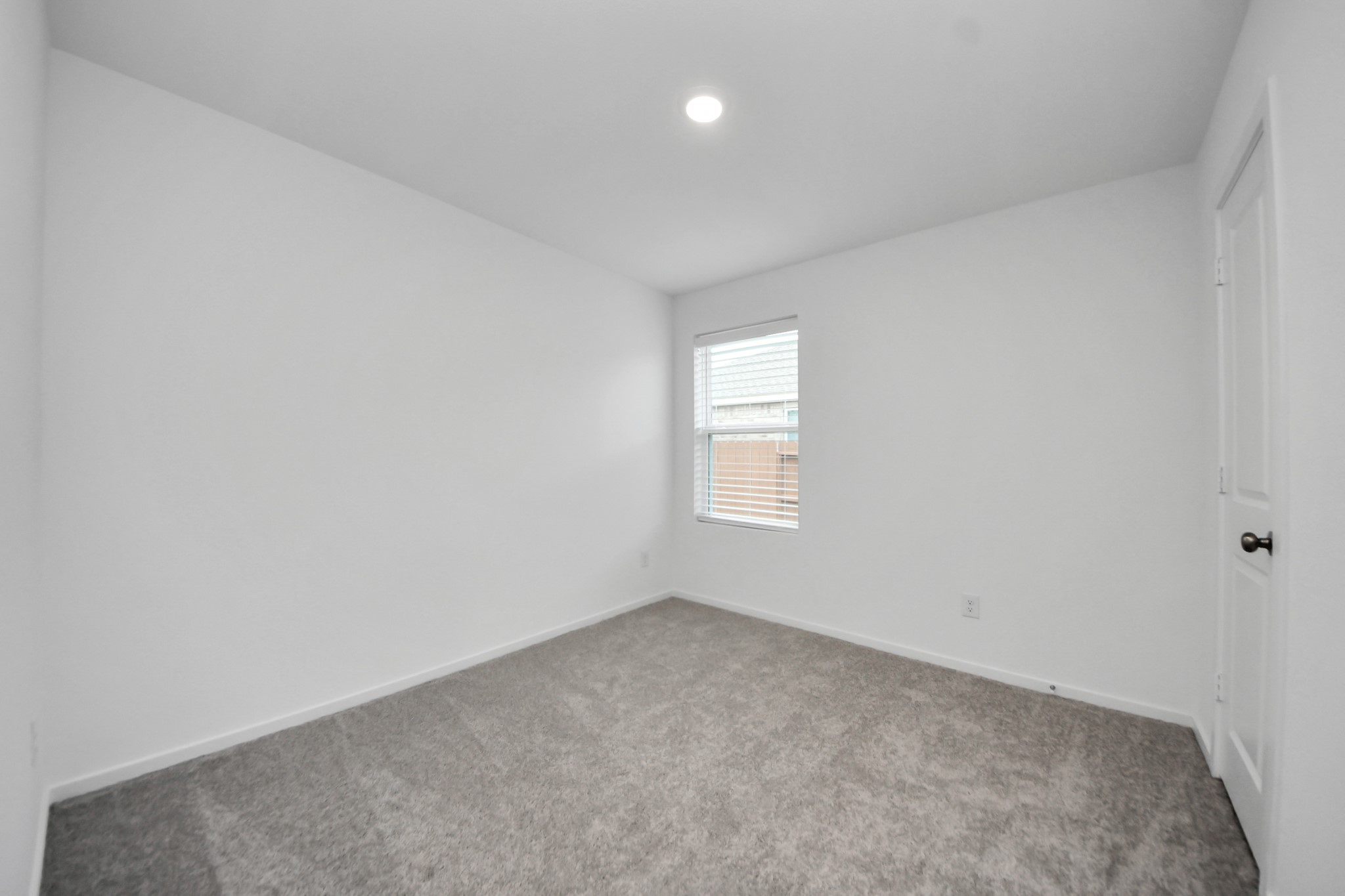 7730 Lavender Jade Drive Rosharon, TX 77583 - Photo 36 of 45 an empty room with a window