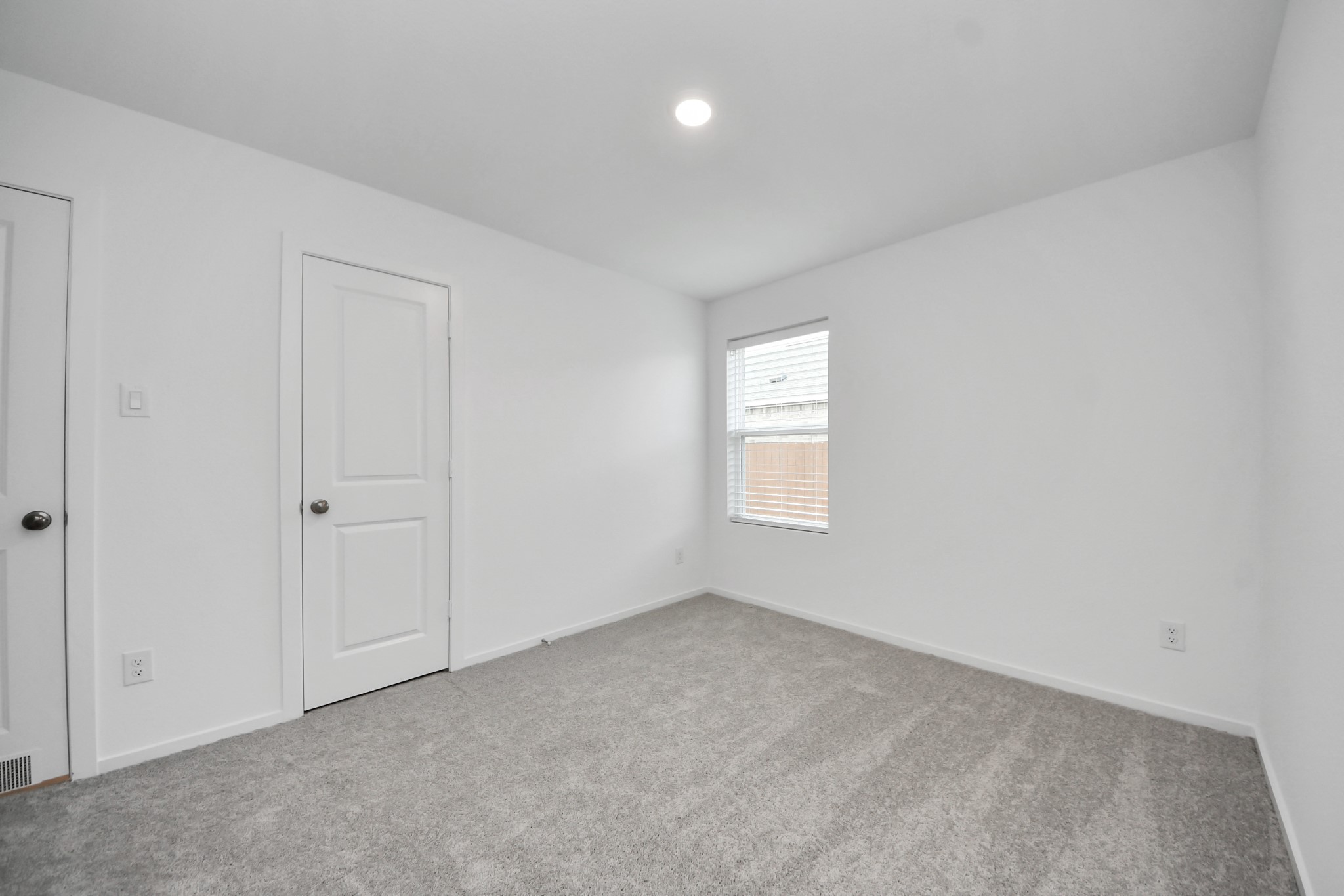 7730 Lavender Jade Drive Rosharon, TX 77583 - Photo 37 of 45 a view of an empty room and a window