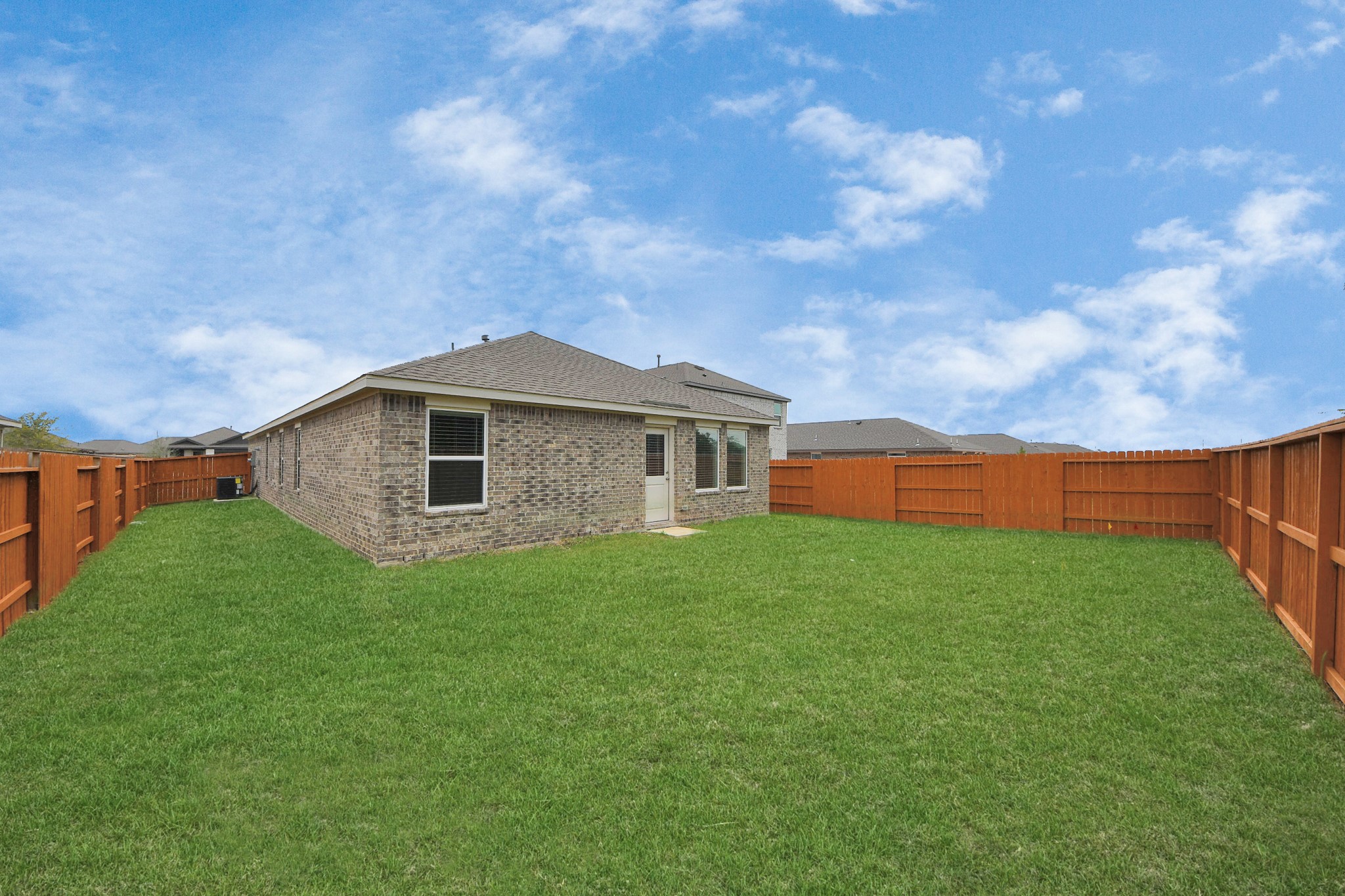 7730 Lavender Jade Drive Rosharon, TX 77583 - Photo 40 of 45 a backyard of a house with lots of green space