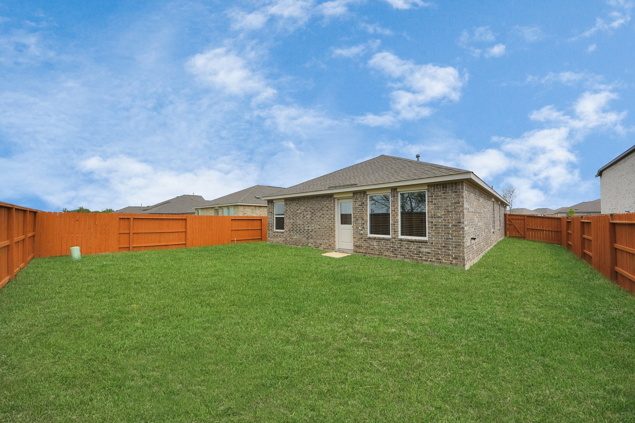 7730 Lavender Jade Drive Rosharon, TX 77583 - Photo 41 of 45 a backyard of a house with lots of green space