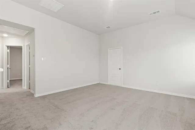 an empty room with an entryway