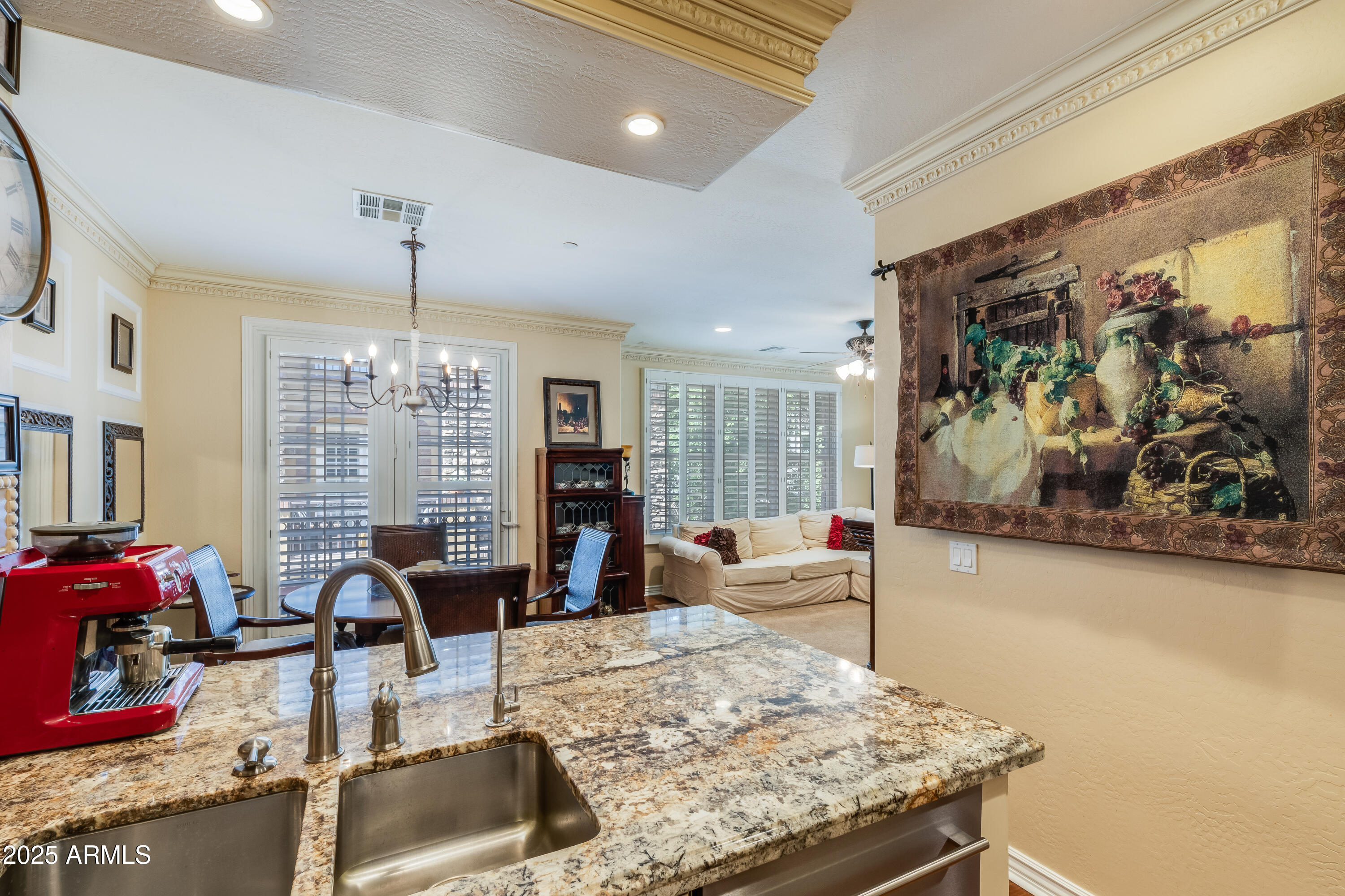 2450 East Roma Avenue, Unit 8 Phoenix, AZ 85016 - Photo 15 of 33 a living room with furniture and a large window