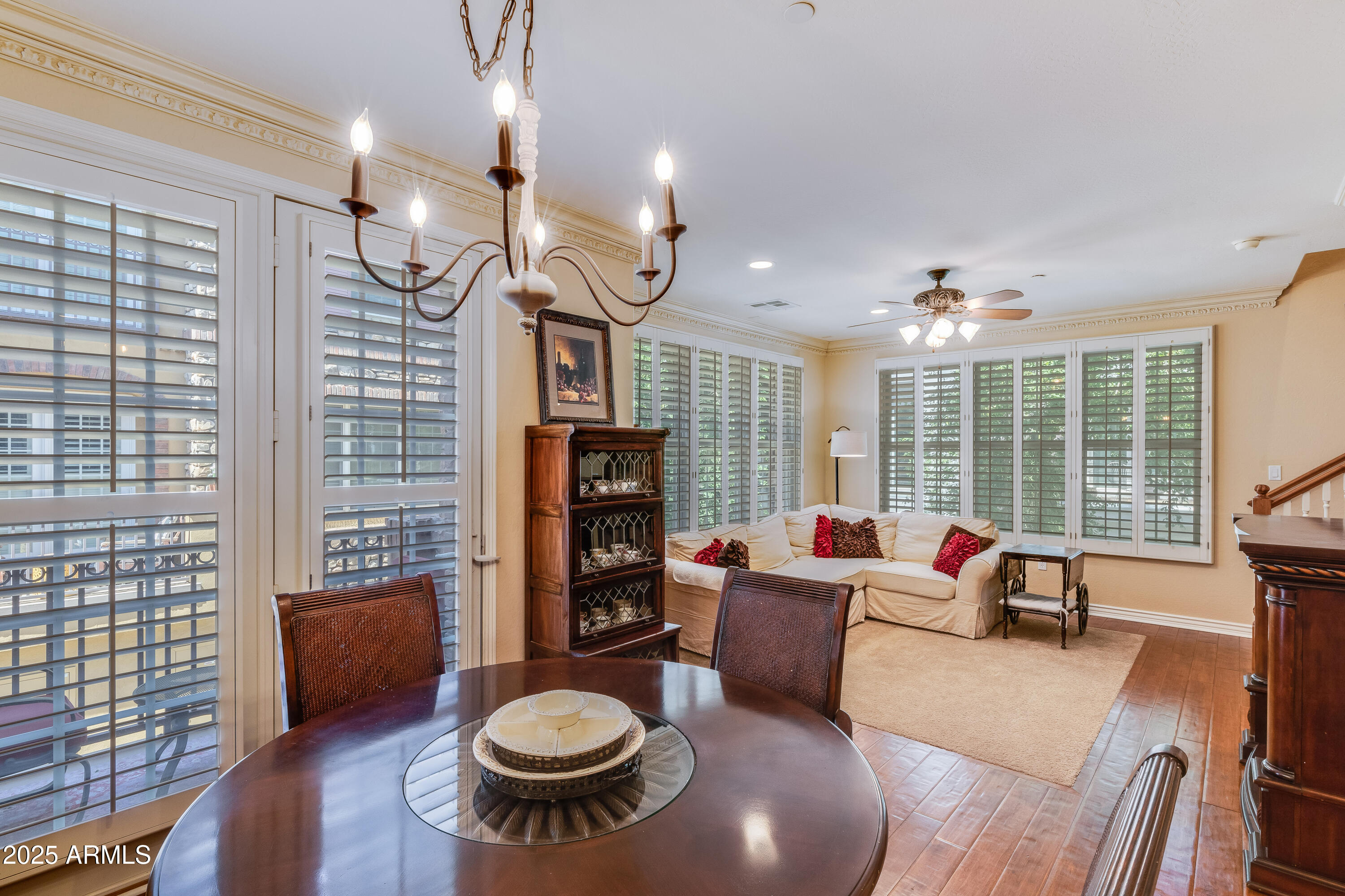 2450 East Roma Avenue, Unit 8 Phoenix, AZ 85016 - Photo 16 of 33 a living room with furniture a rug and a floor to ceiling window