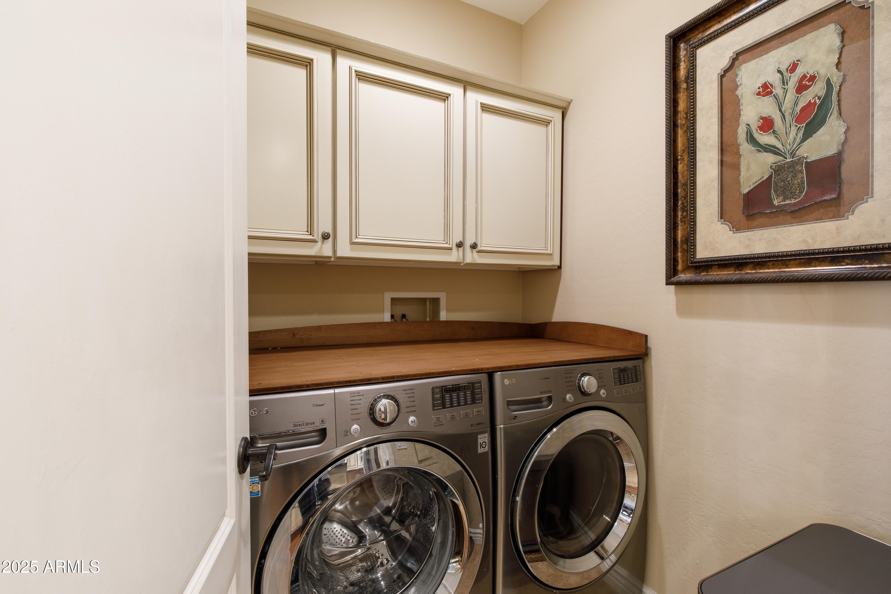 2450 East Roma Avenue, Unit 8 Phoenix, AZ 85016 - Photo 18 of 33 a utility room with dryer and washer