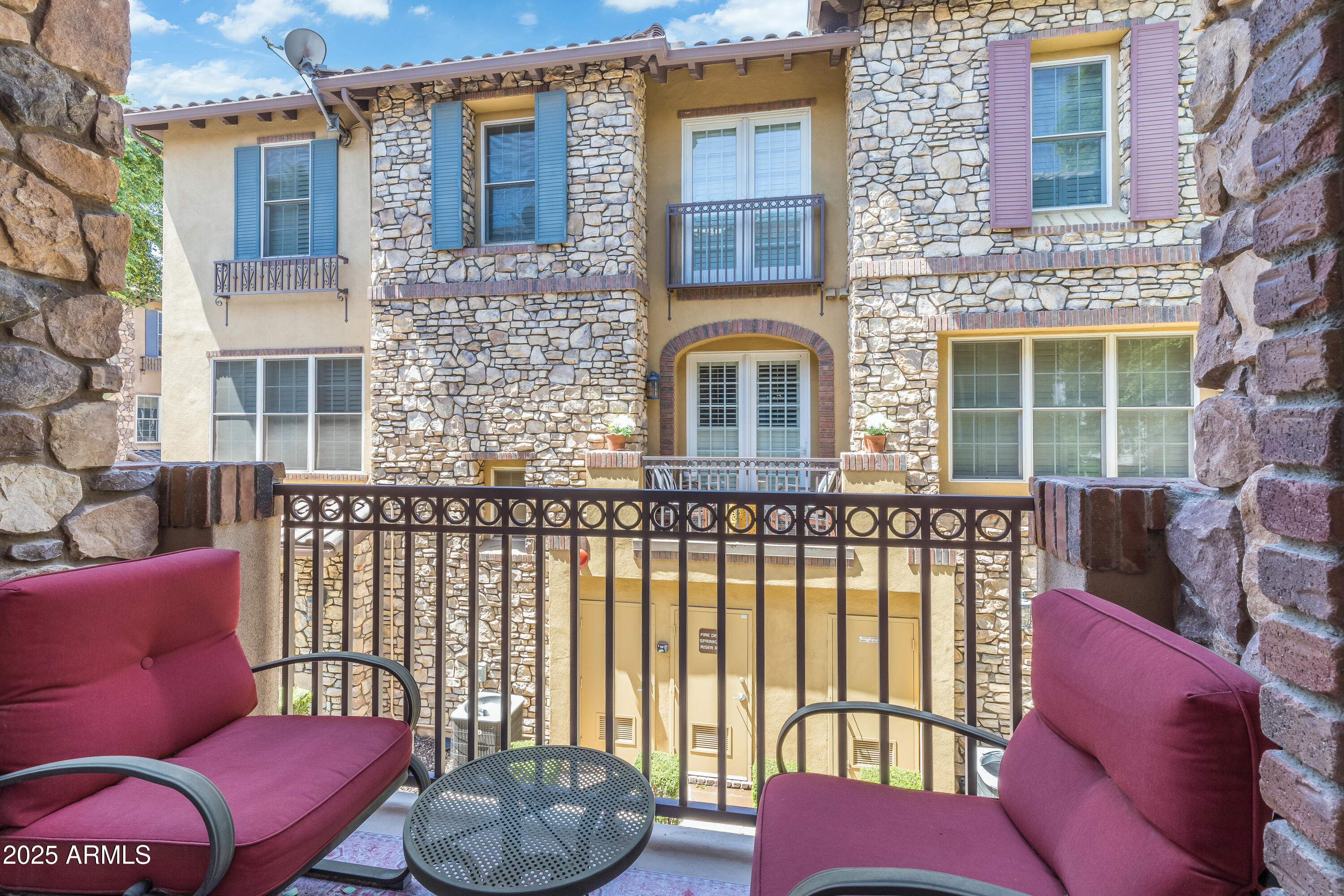 2450 East Roma Avenue, Unit 8 Phoenix, AZ 85016 - Photo 19 of 33 a front view of a house with outdoor seating