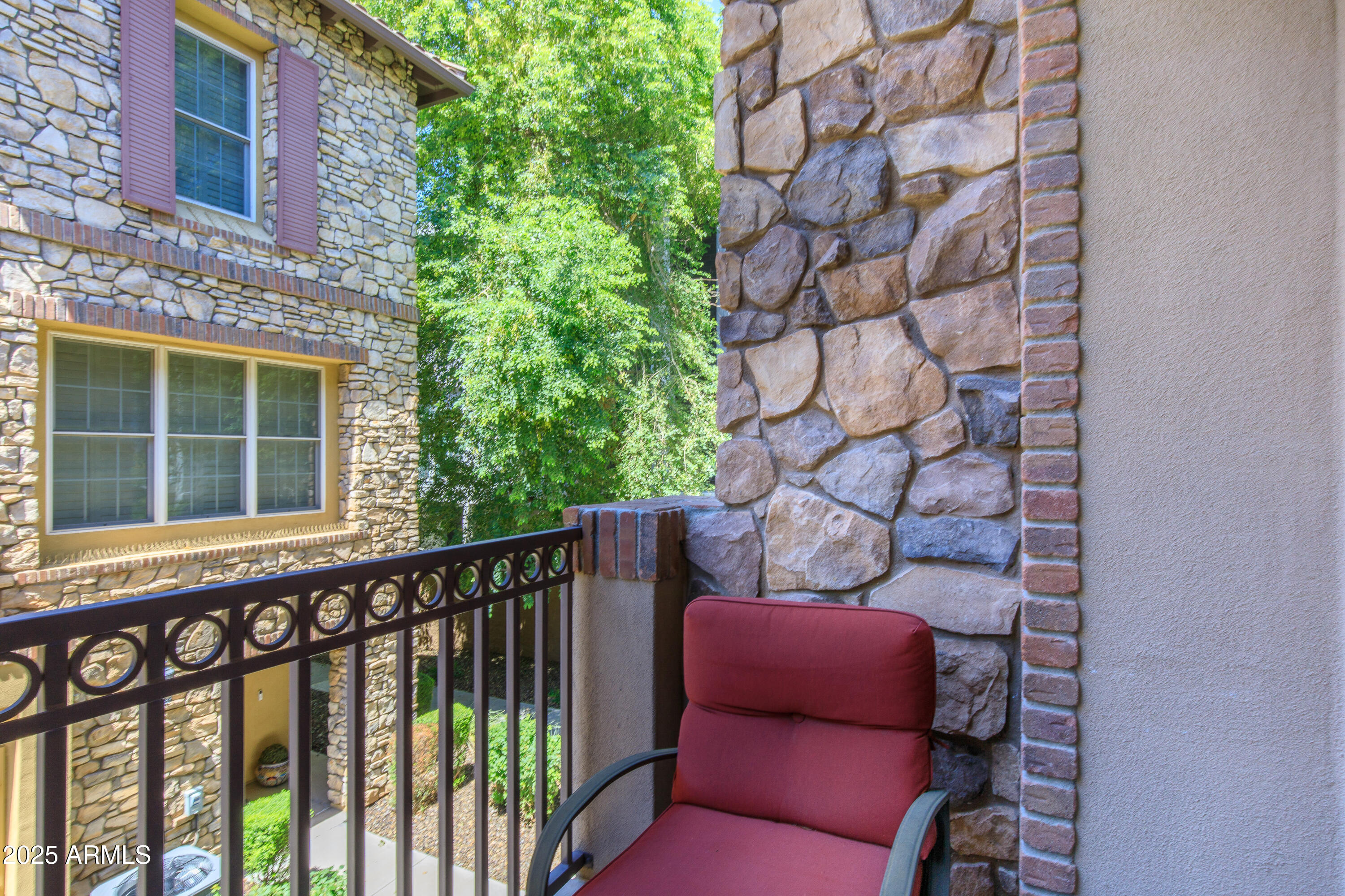 2450 East Roma Avenue, Unit 8 Phoenix, AZ 85016 - Photo 20 of 33 a wooden bench sitting in front of a building