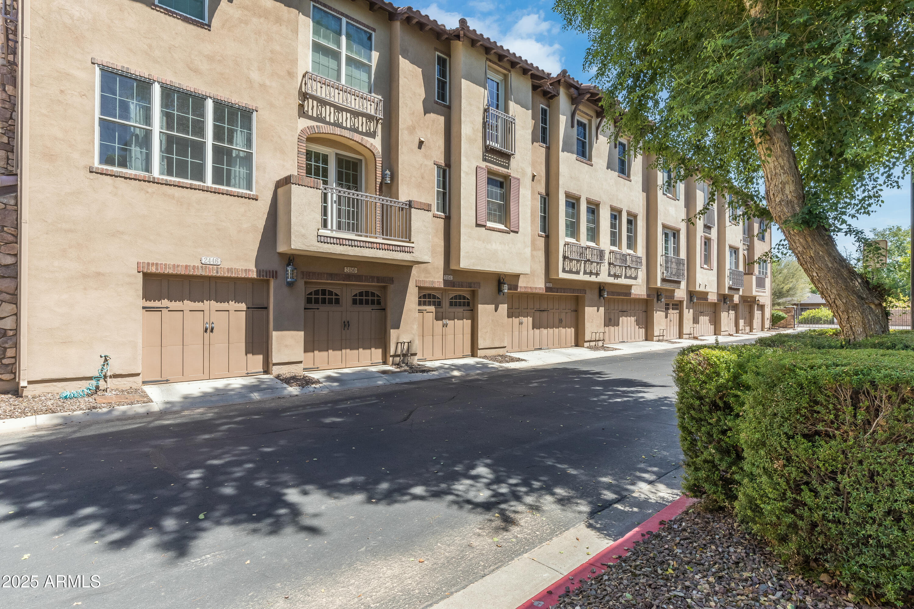 2450 East Roma Avenue, Unit 8 Phoenix, AZ 85016 - Photo 2 of 33 a front view of a building with a street