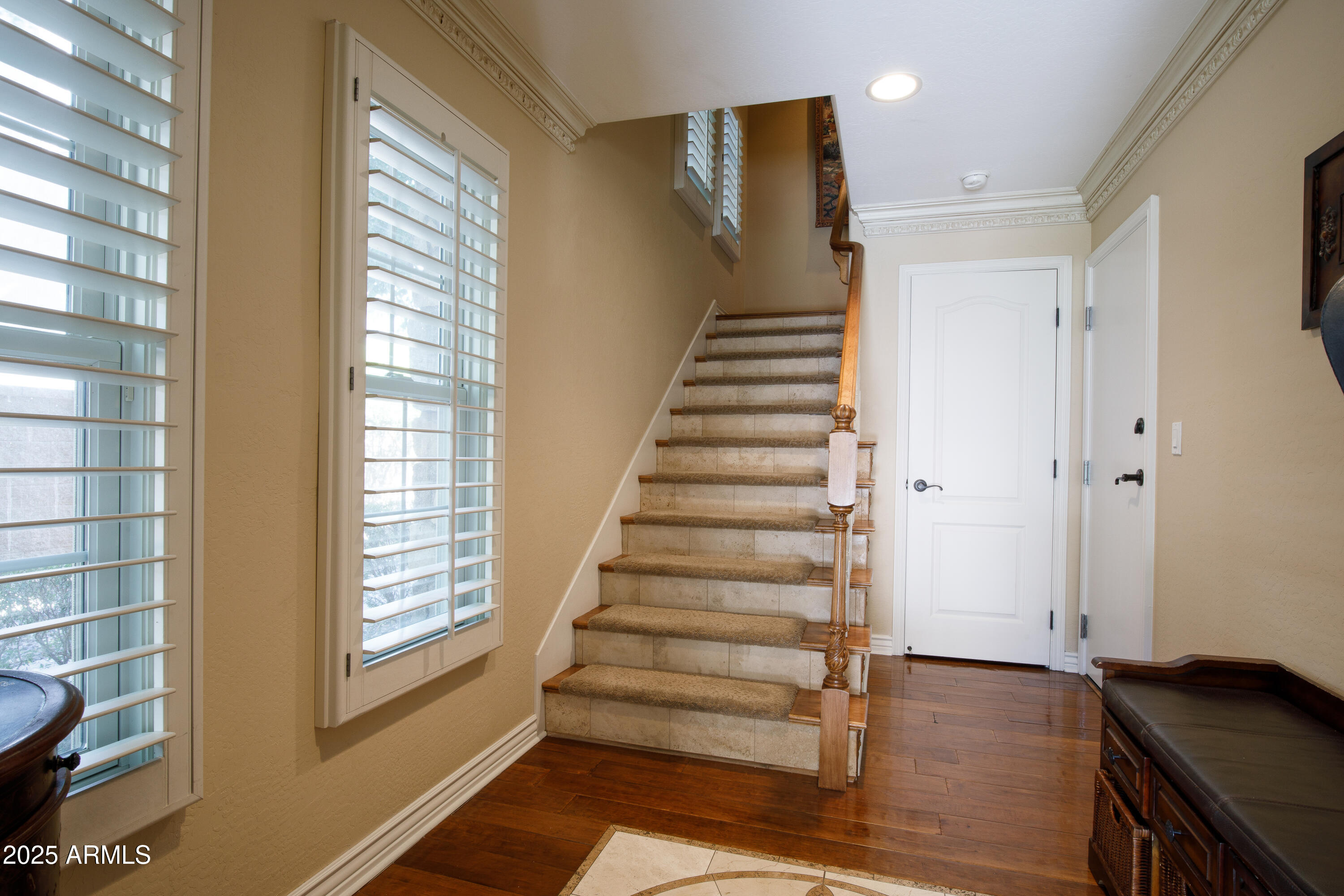 2450 East Roma Avenue, Unit 8 Phoenix, AZ 85016 - Photo 3 of 33 a view of entryway with wooden floor