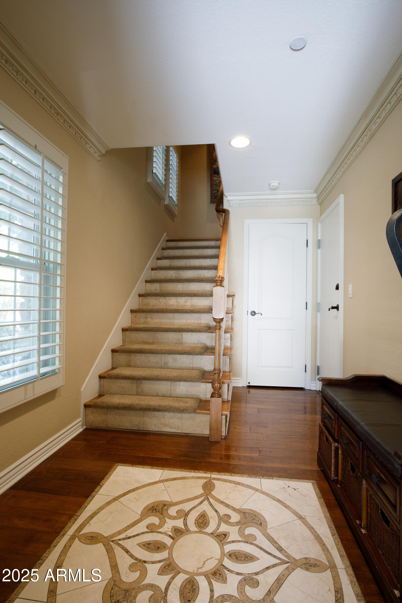 2450 East Roma Avenue, Unit 8 Phoenix, AZ 85016 - Photo 4 of 33 a view of entryway with wooden floor