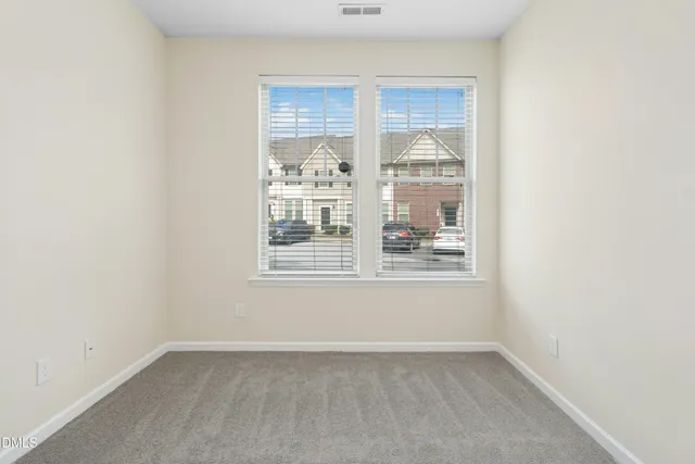 a kitchen with a sink stove and microwave