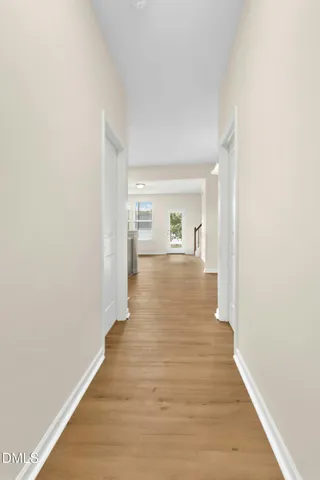 a view of a bathroom from the hallway