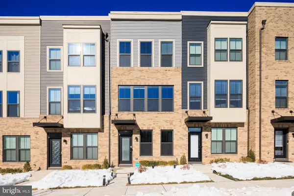 a front view of a building with a street