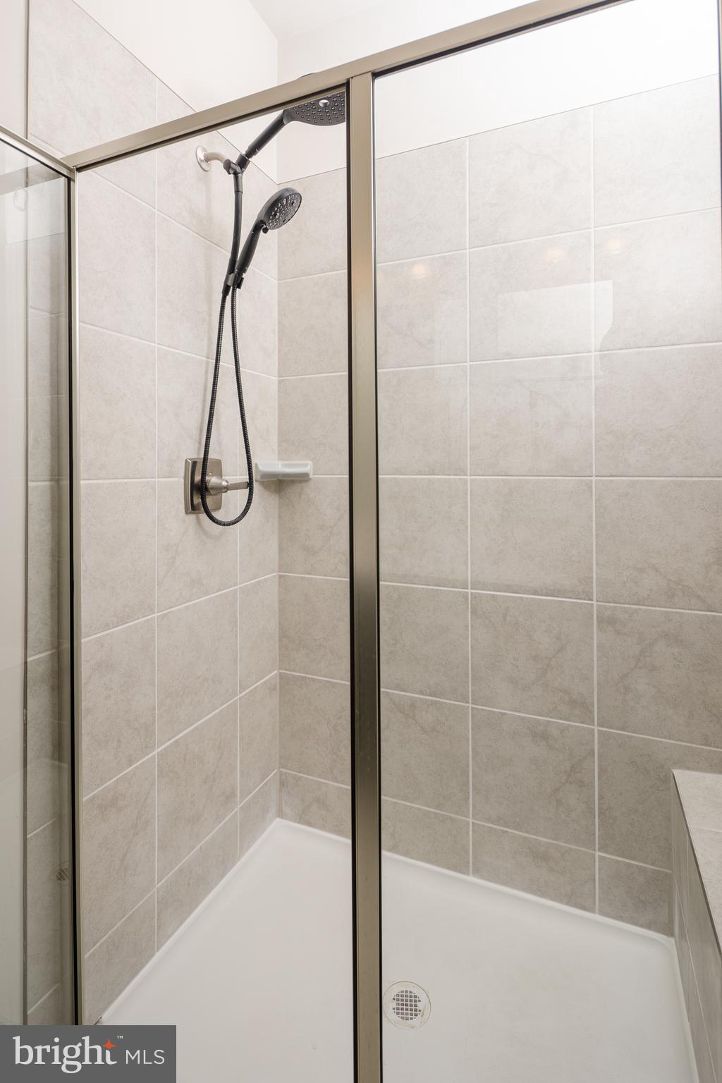 1920 Four Roses Street Baltimore, MD 21222 - Photo 19 of 37 a bathroom that has a shower