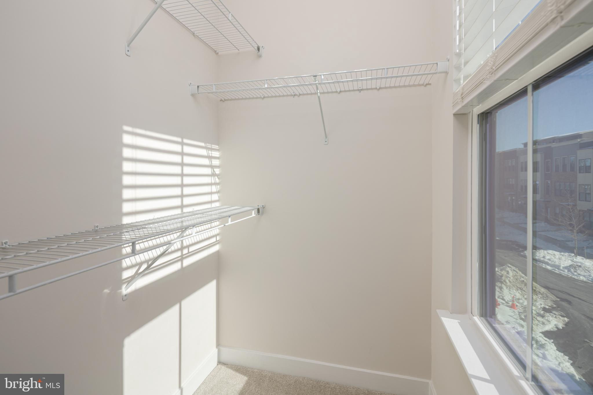 1920 Four Roses Street Baltimore, MD 21222 - Photo 26 of 37 a bathroom with a window and a shower