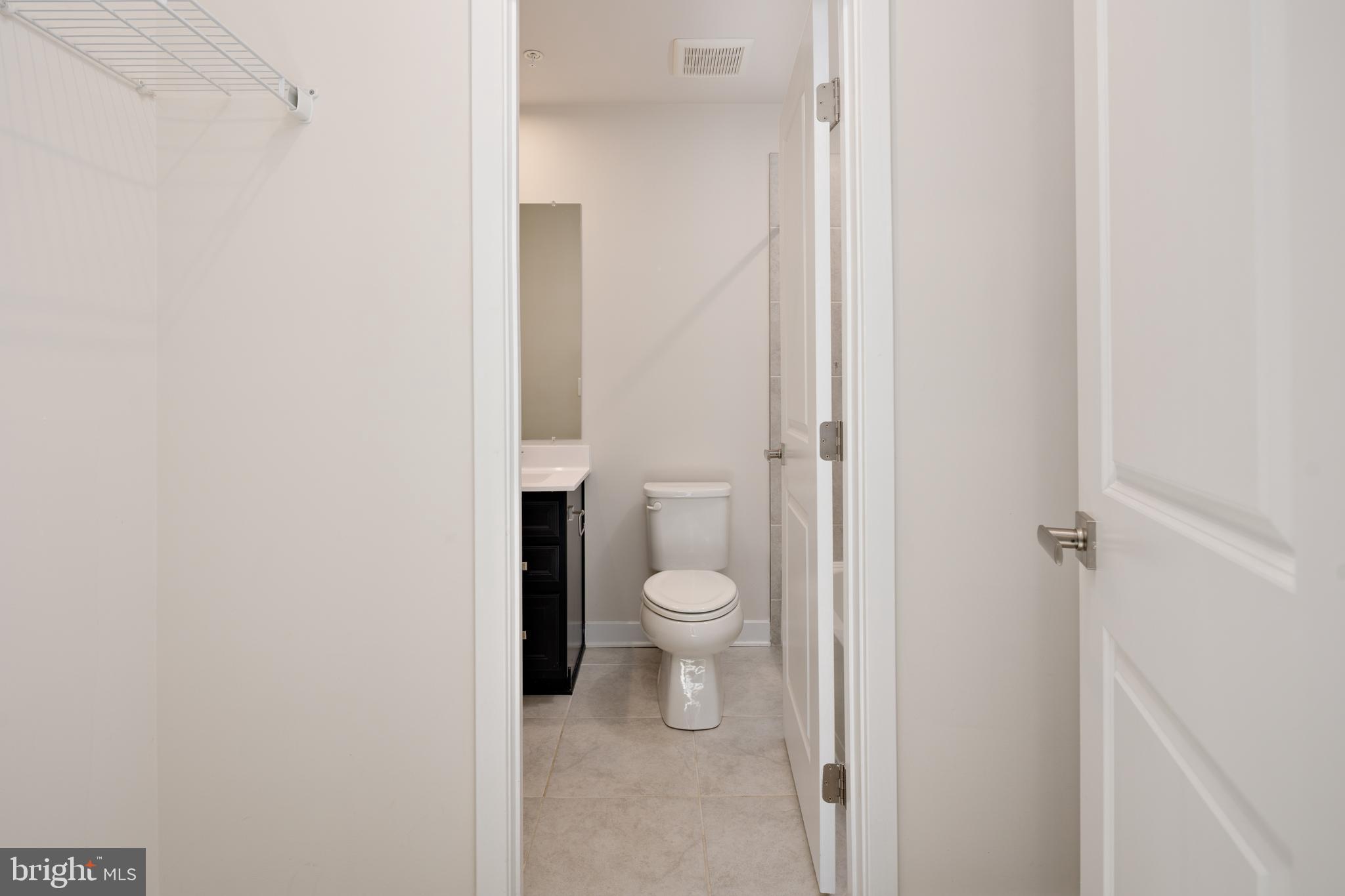 1920 Four Roses Street Baltimore, MD 21222 - Photo 31 of 37 a bathroom with a toilet