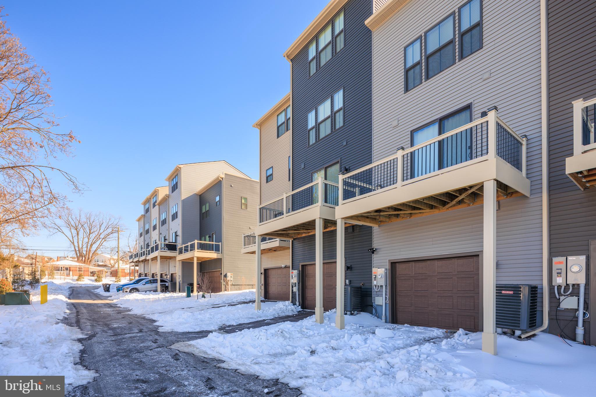 1920 Four Roses Street Baltimore, MD 21222 - Photo 36 of 37 a front view of a building with a yard