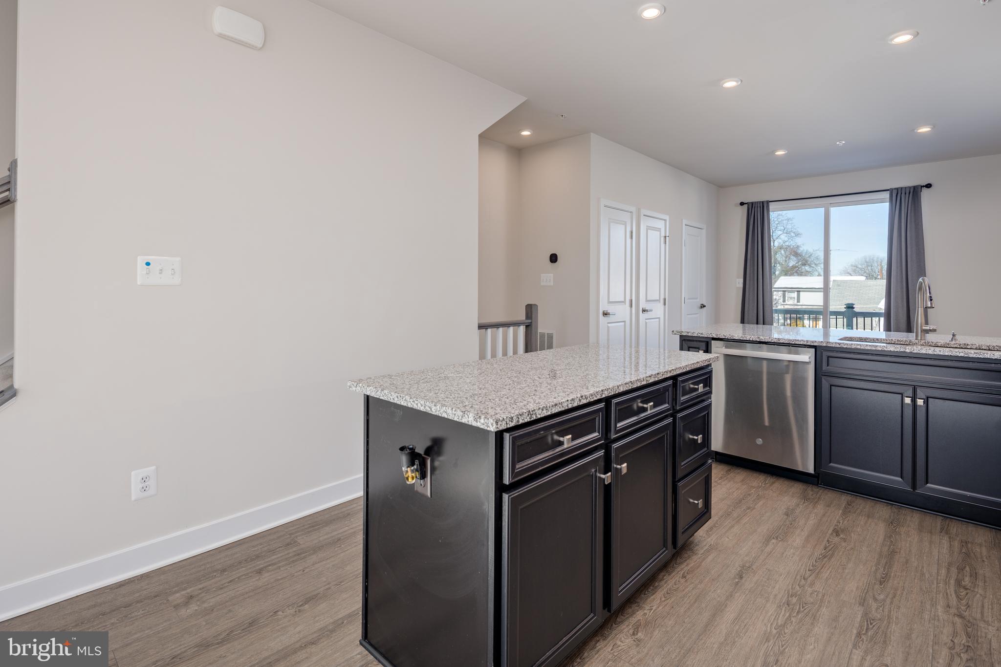1920 Four Roses Street Baltimore, MD 21222 - Photo 9 of 37 a kitchen with a stove and a sink