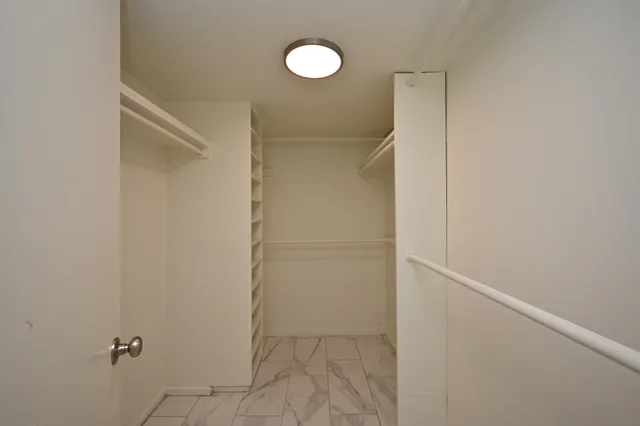 a view of a room with rack on the wall