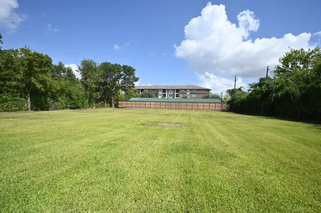 a view of a backyard with a garden
