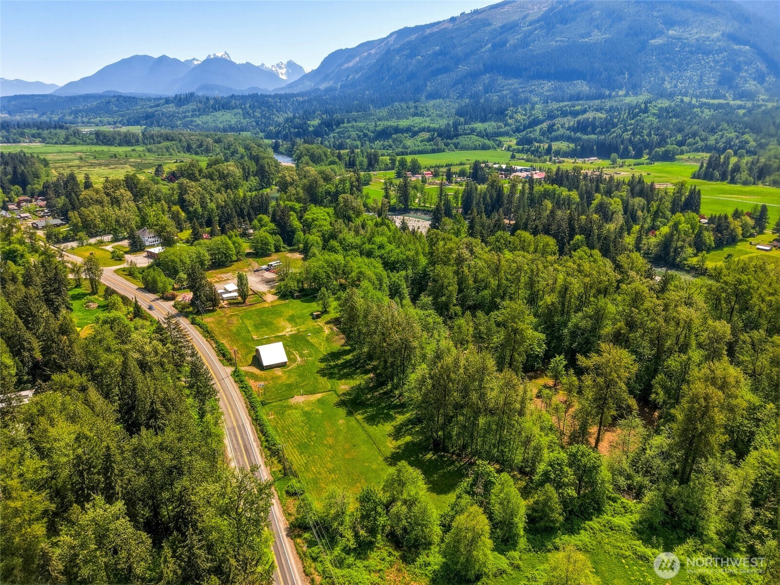 21716 State Rte 530 Northeast Arlington, WA 98223 - Photo 37 of 38 a view of a lush green hillside and houses