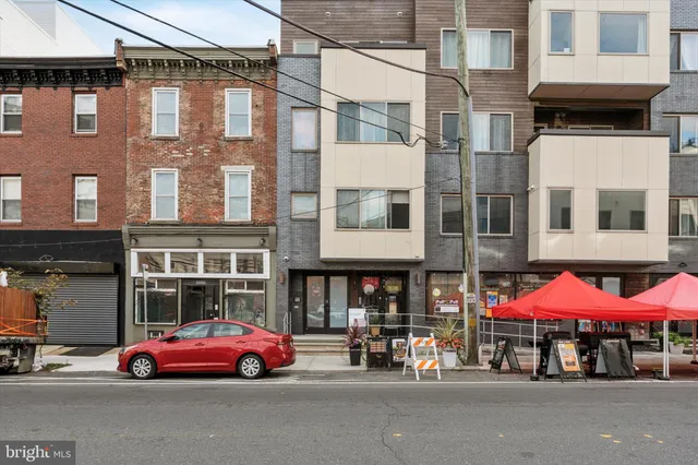 a front view of a building with street