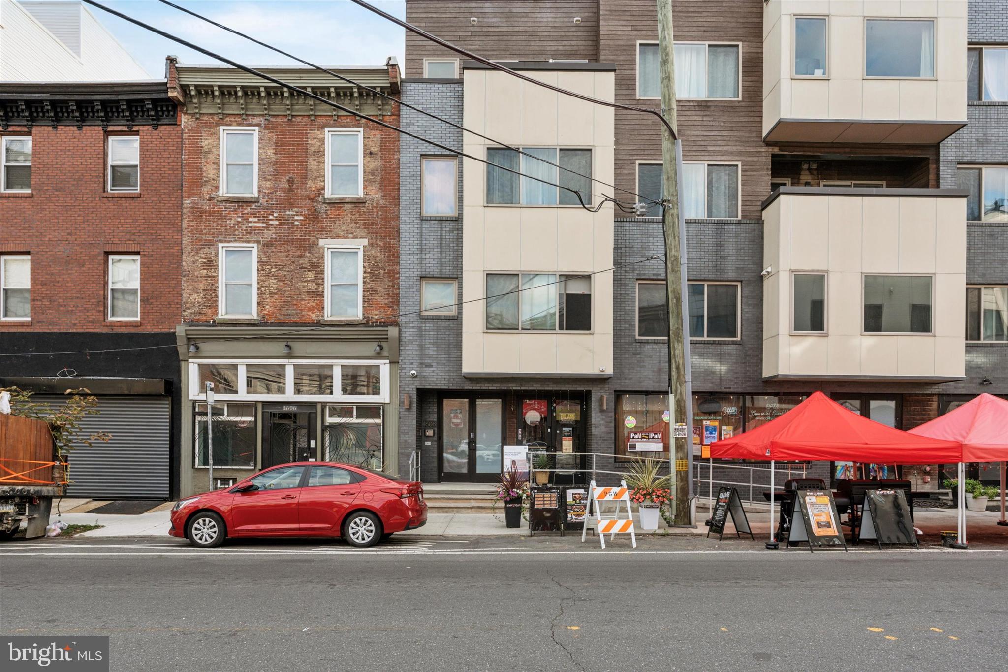 a front view of a building with street