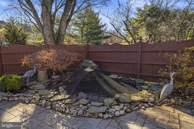 a view of a backyard of the house