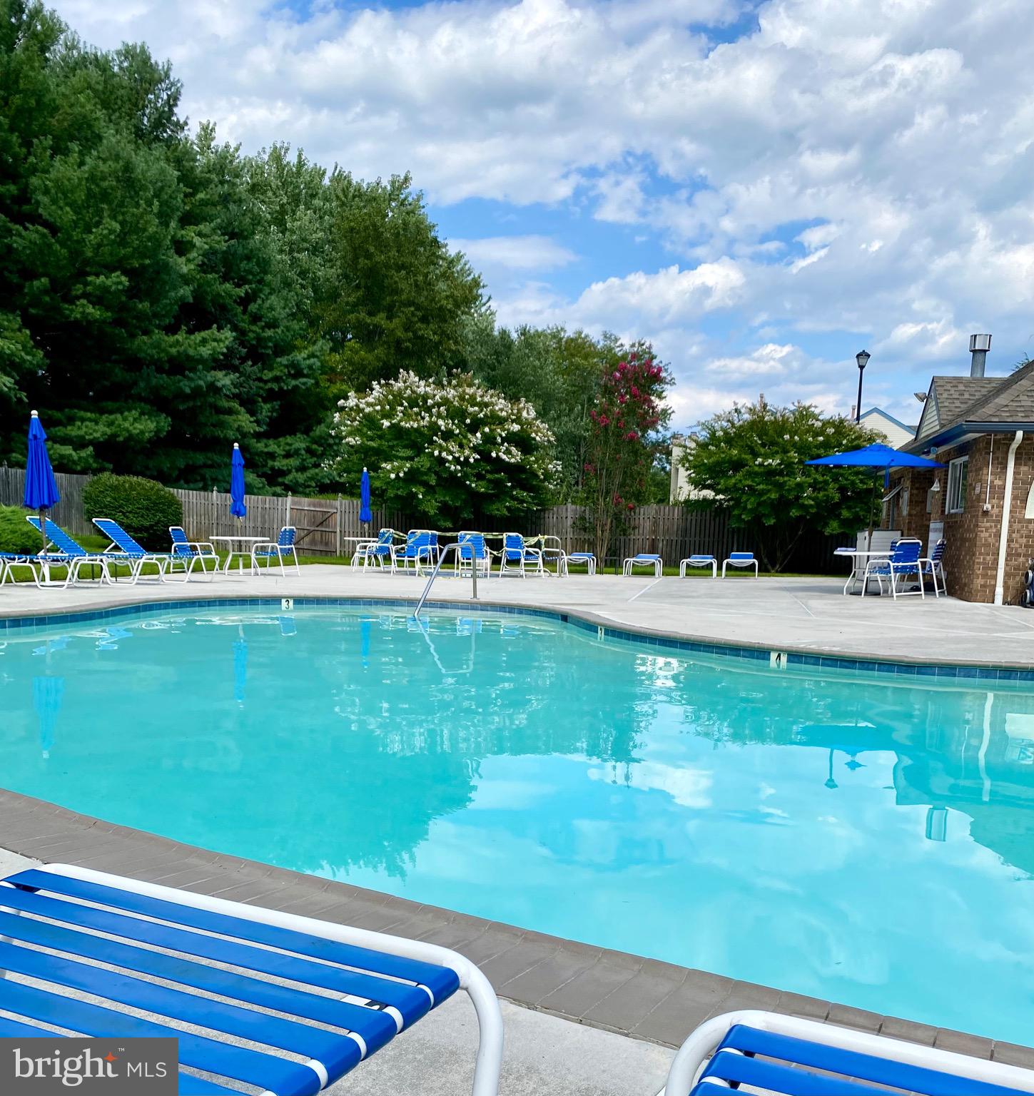 1 Hilltop Lane Medford, NJ 08055 - Photo 42 of 50 a view of swimming pool with a garden and trees