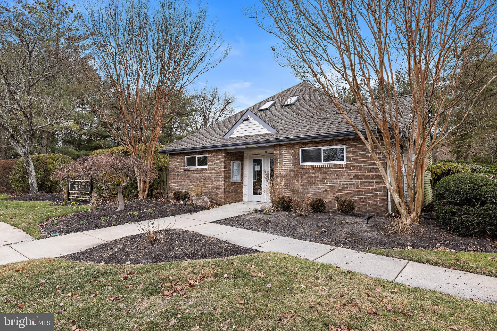 1 Hilltop Lane Medford, NJ 08055 - Photo 45 of 50 a front view of a house with a yard and potted plants