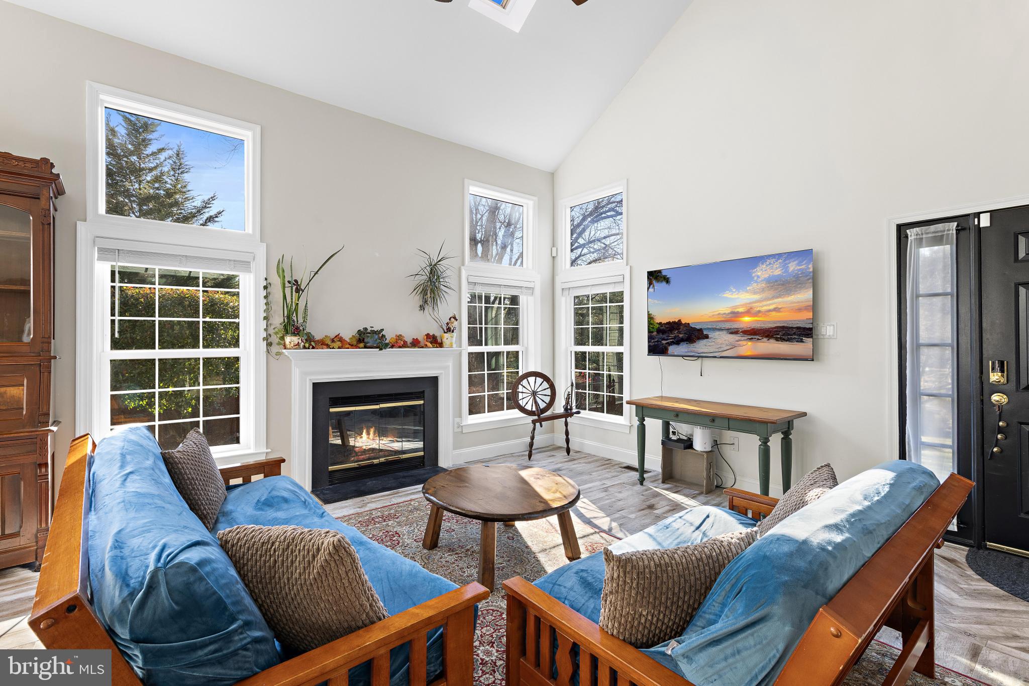 1 Hilltop Lane Medford, NJ 08055 - Photo 5 of 50 a living room with furniture a flat screen tv and a fireplace