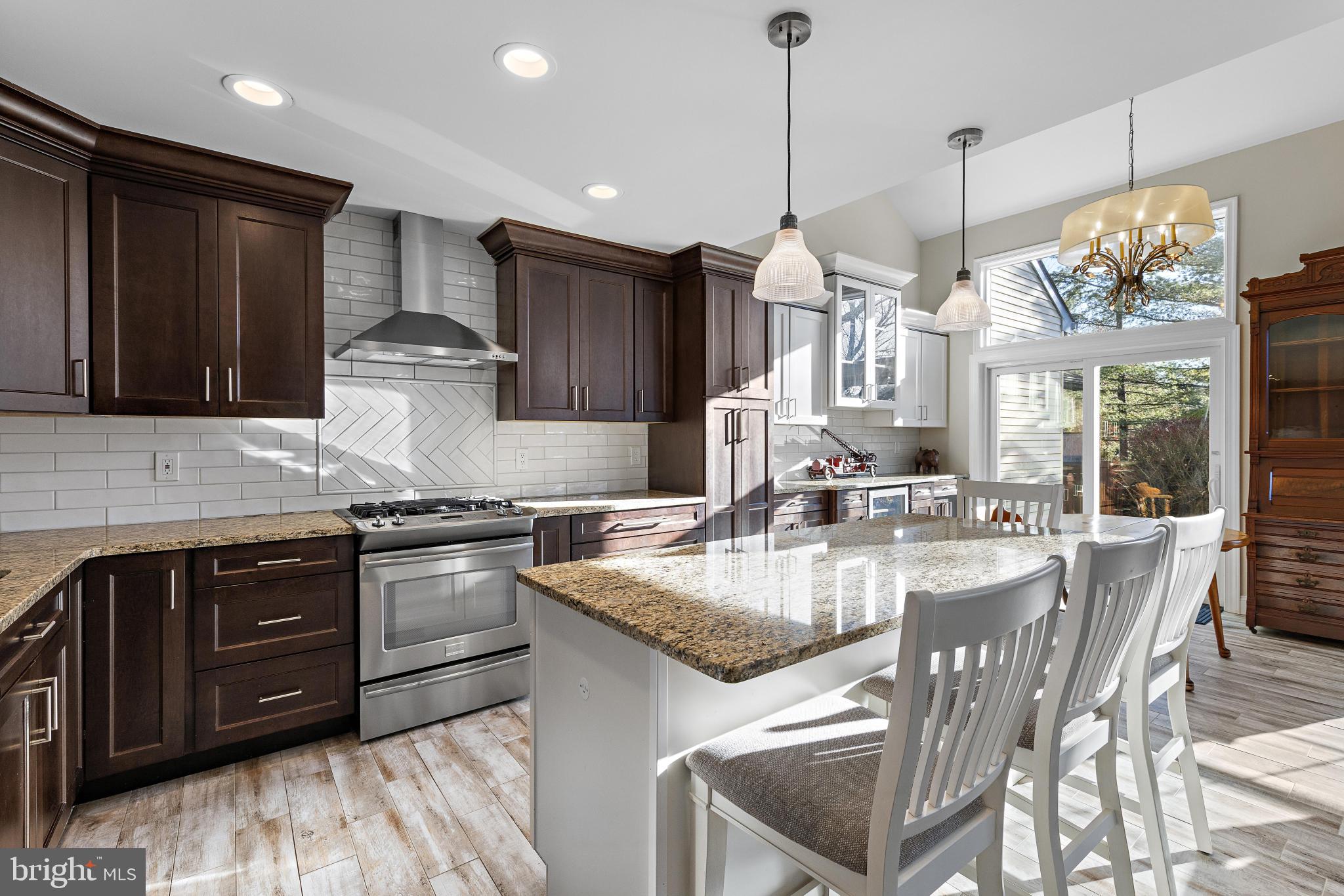 1 Hilltop Lane Medford, NJ 08055 - Photo 9 of 50 a kitchen with stainless steel appliances granite countertop a sink a stove and a wooden floors