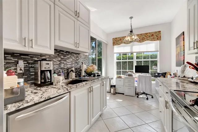 $440,000 | 6560 Villa Sonrisa Drive, Unit 1311, Boca Raton, FL 33433