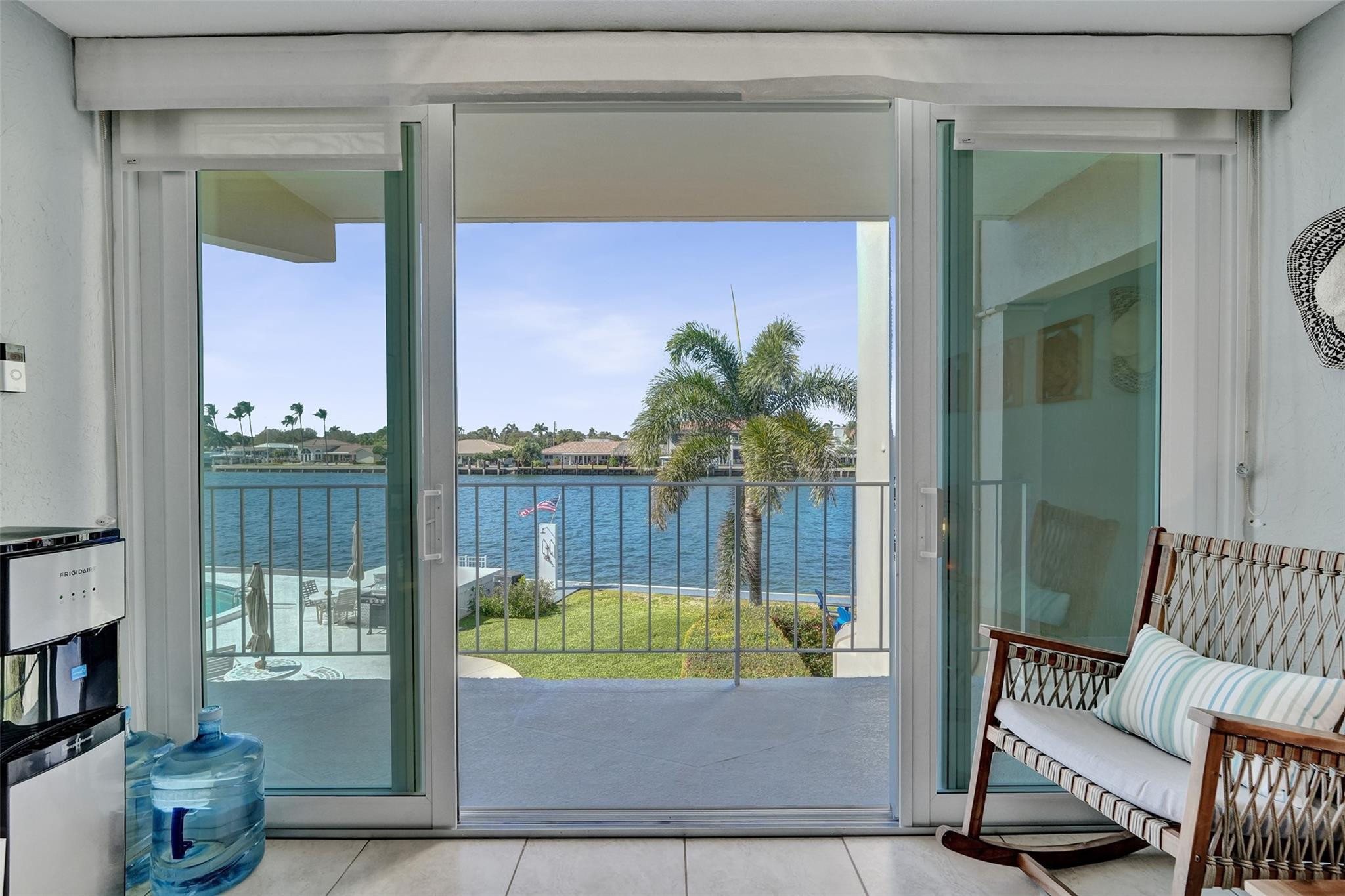 801 North Riverside Drive, Unit 4B Pompano Beach, FL 33062 - Photo 2 of 43 a view of a bedroom with furniture and a potted plant
