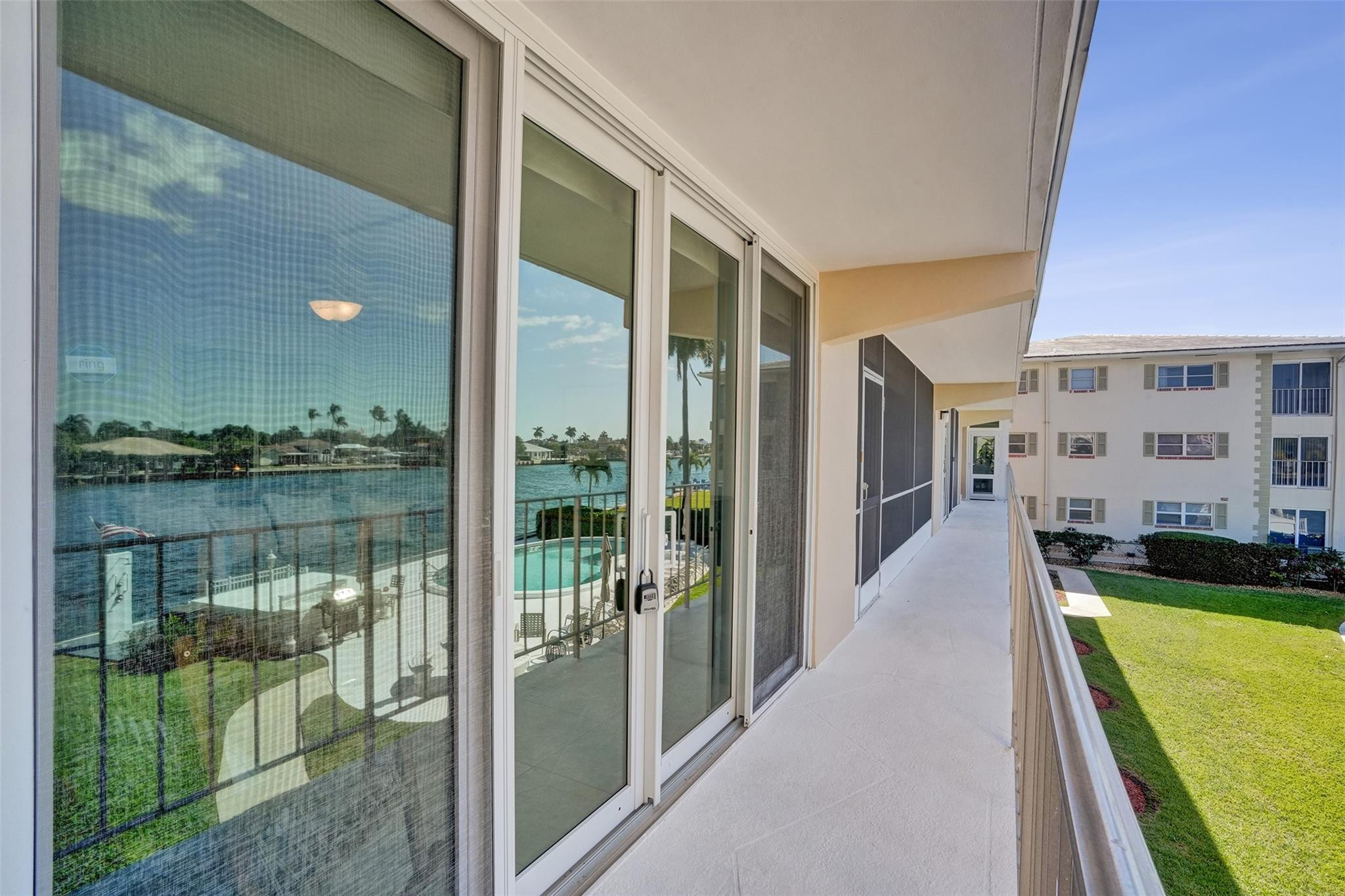 801 North Riverside Drive, Unit 4B Pompano Beach, FL 33062 - Photo 24 of 43 a balcony with view of swimming pool