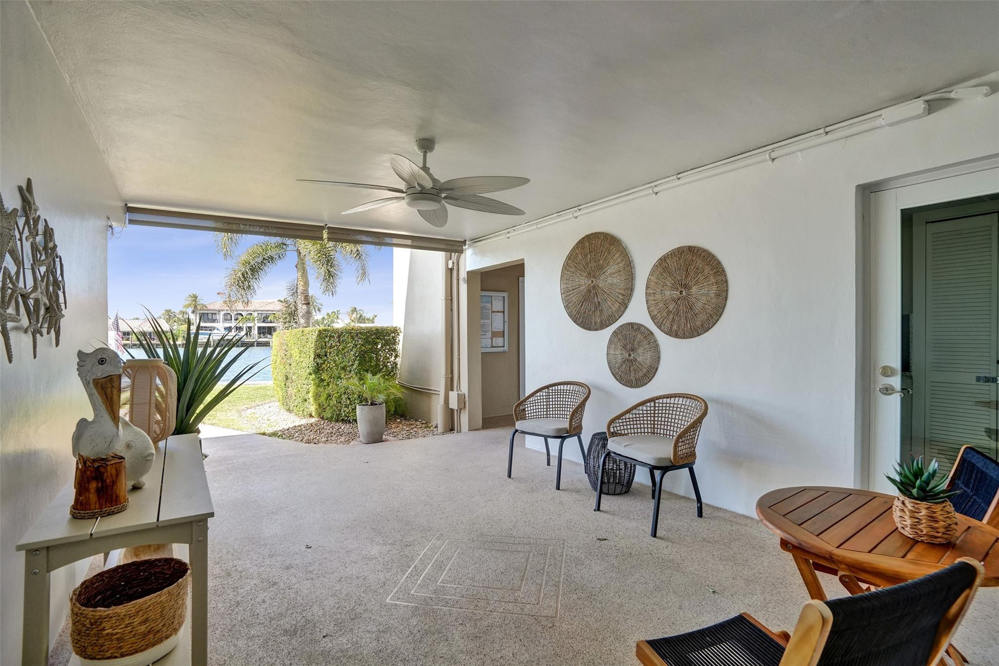 801 North Riverside Drive, Unit 4B Pompano Beach, FL 33062 - Photo 31 of 43 a view of a livingroom with furniture and a large window