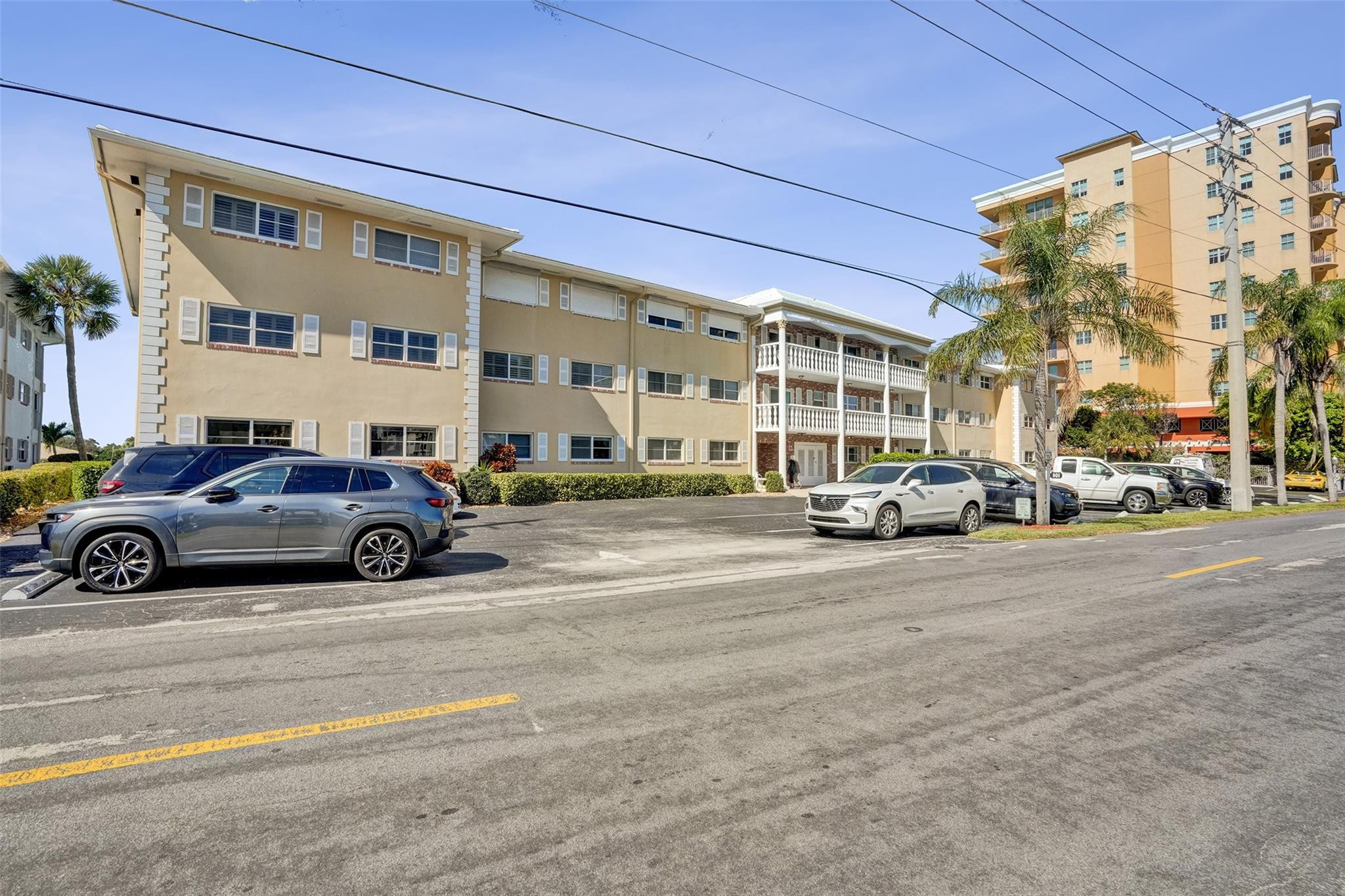 801 North Riverside Drive, Unit 4B Pompano Beach, FL 33062 - Photo 34 of 43 a view of a cars park in front of a building