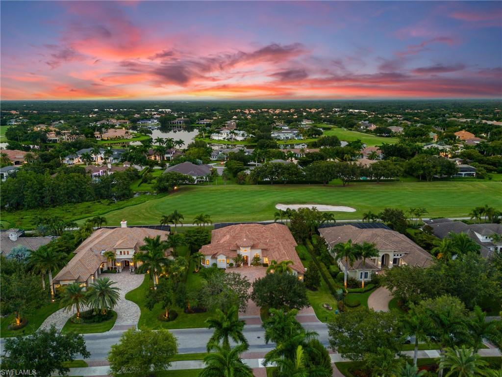 5903 Burnham Road Naples, FL 34119 - Photo 35 of 38 an aerial view of a houses with outdoor space and street view