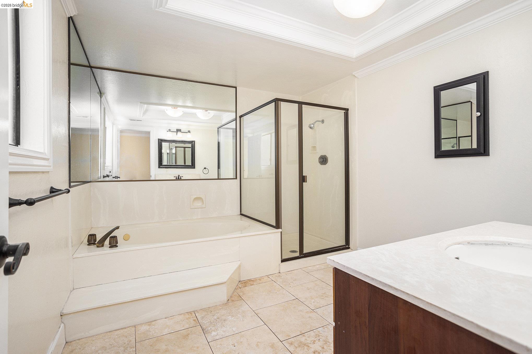 3000 Sombrero Circle San Ramon, CA 94583 - Photo 13 of 19 a bathroom with a tub a sink and a mirror