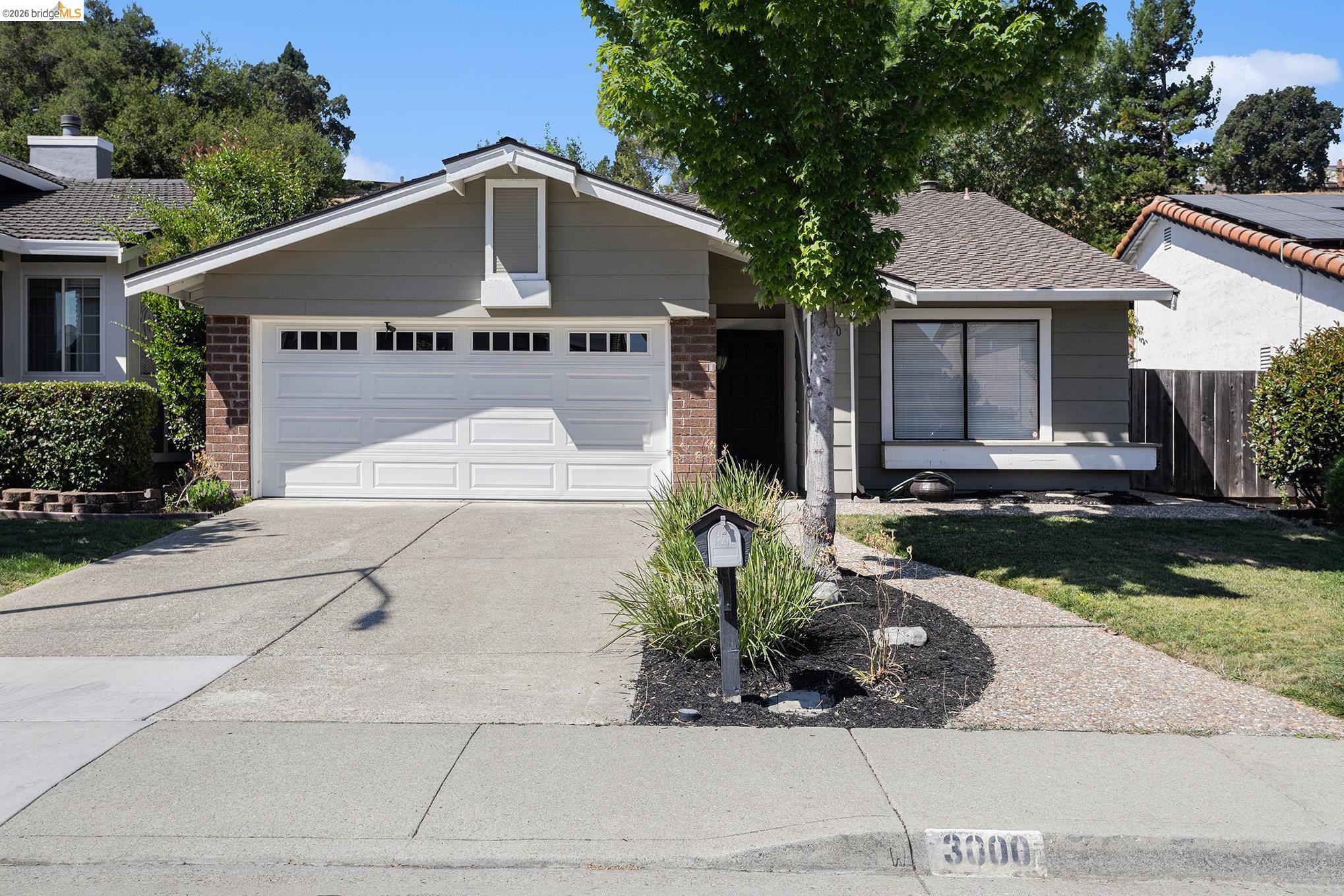 3000 Sombrero Circle San Ramon, CA 94583 - Photo 2 of 19 a front view of a house with garden