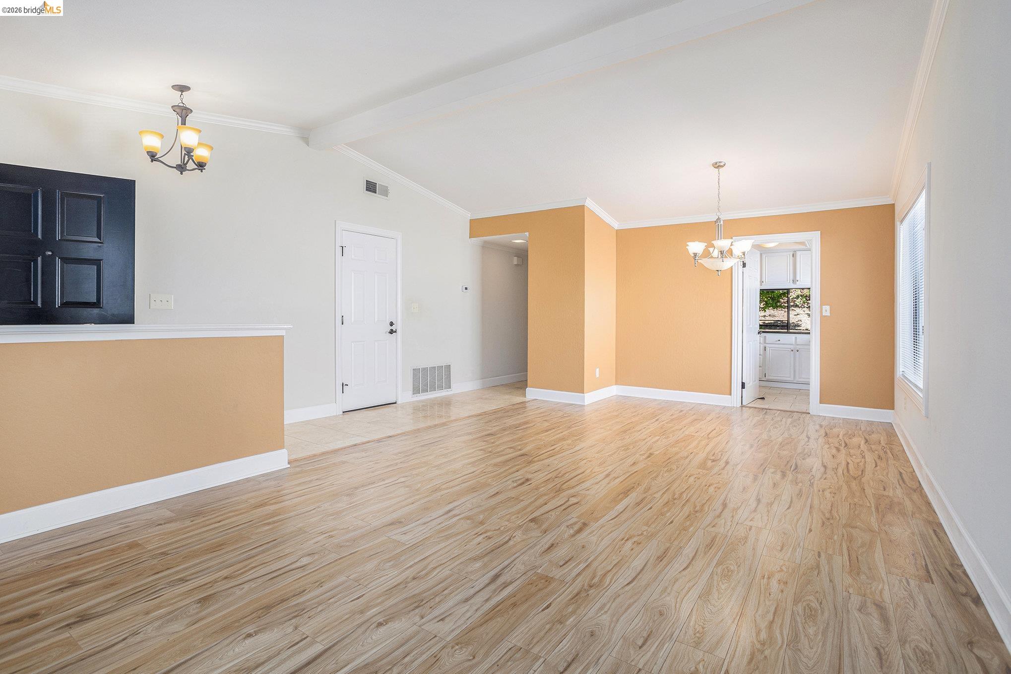 3000 Sombrero Circle San Ramon, CA 94583 - Photo 4 of 19 a view of an empty room with wooden floor